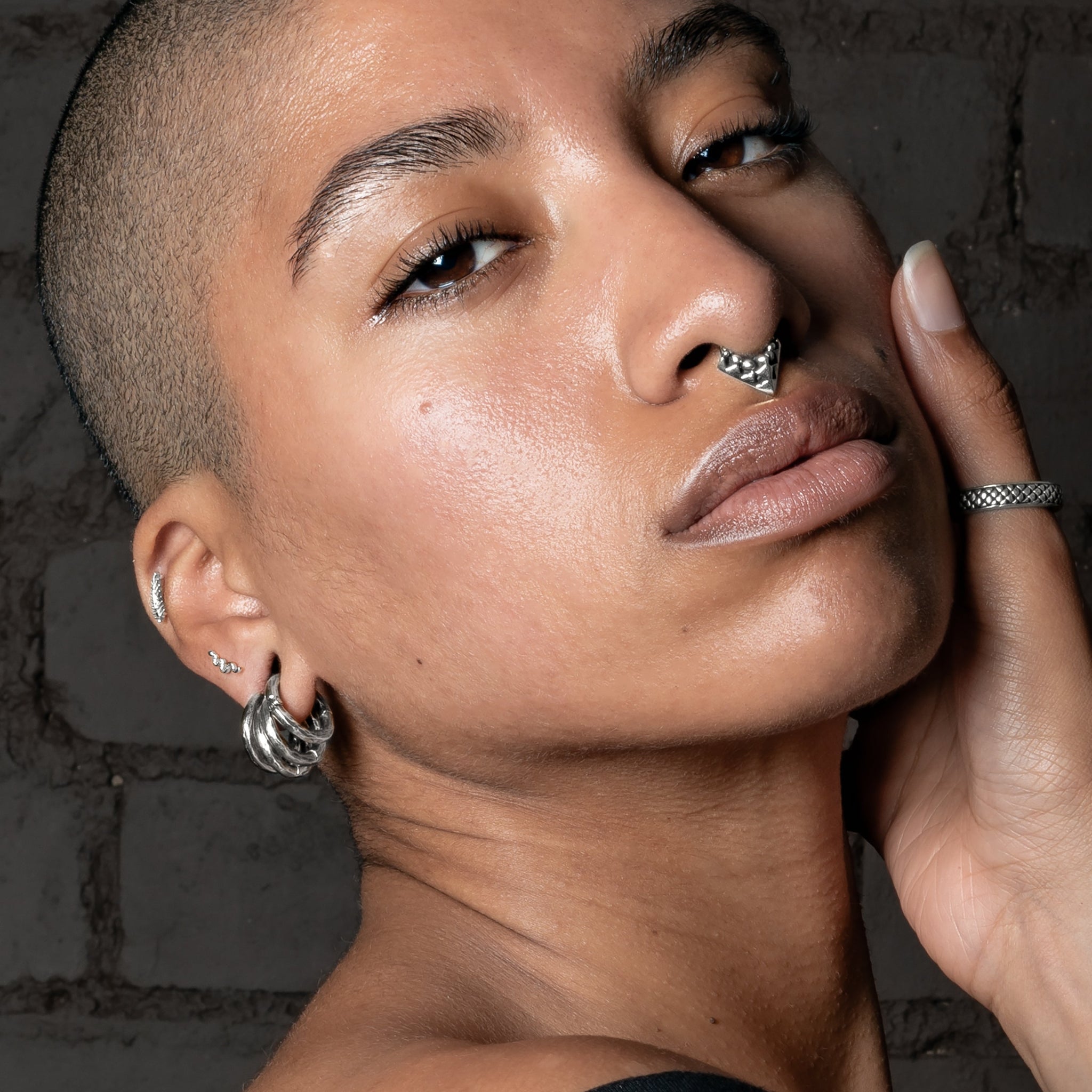 women with septum, helix, cartilage piercing, ear gauges
