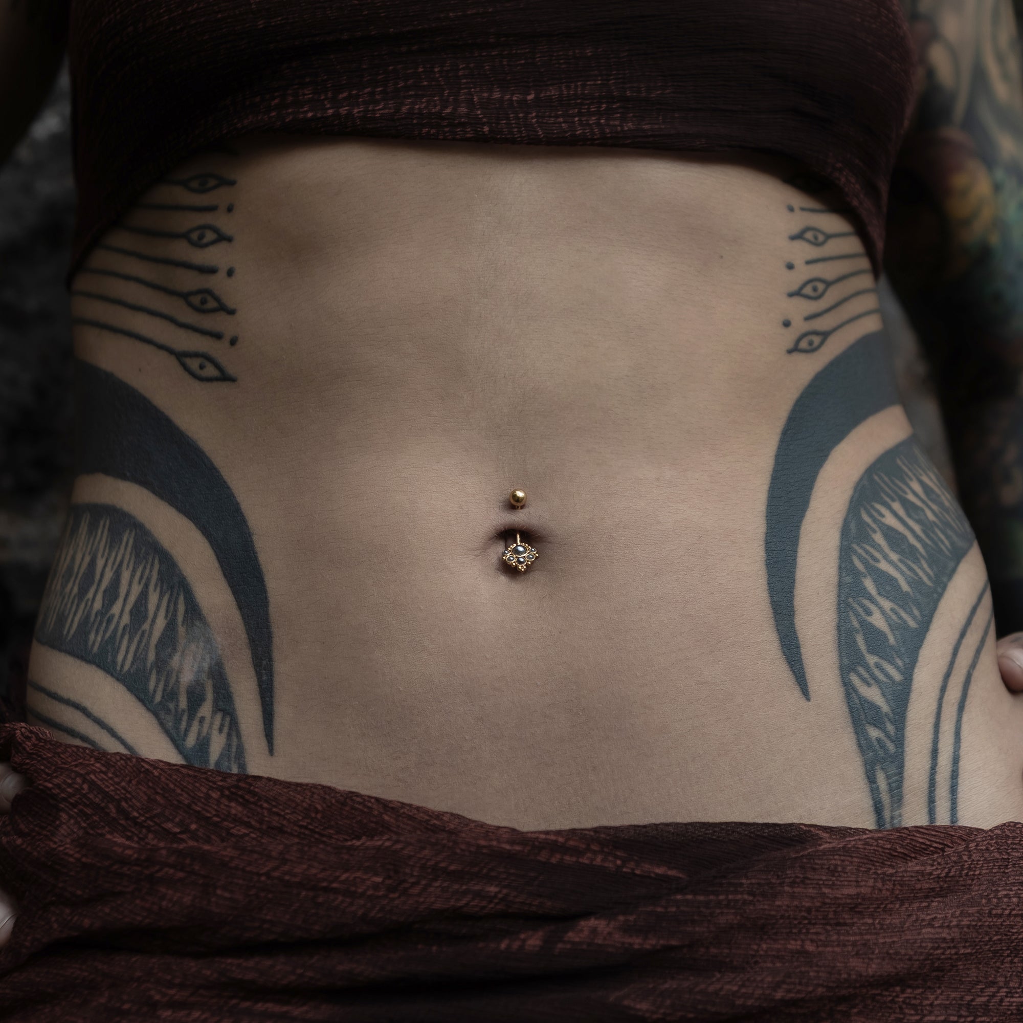 Durga Navel Piercing