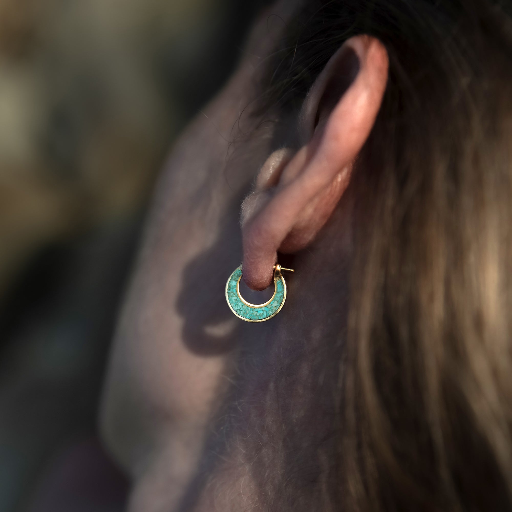 model wearing Golden Aanya Turquoise hoop huggies Earrings