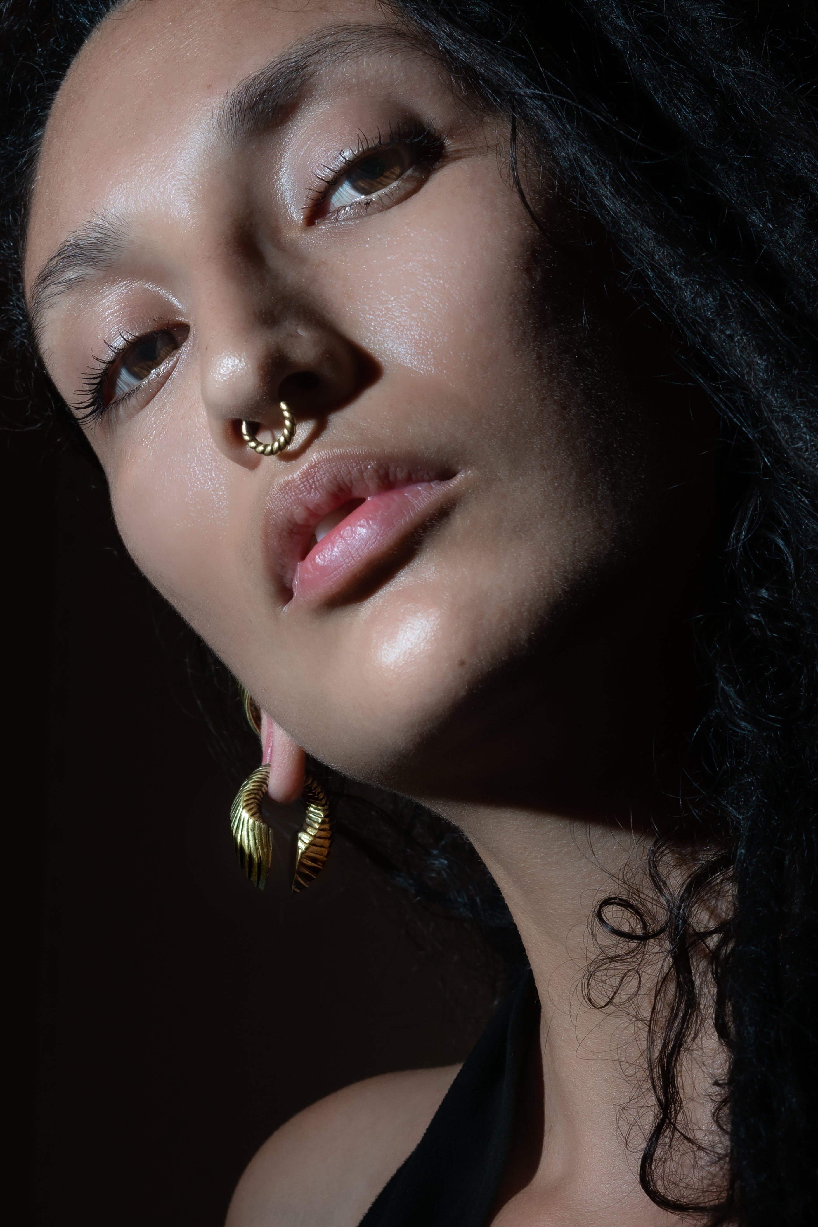model wearing Golden Amari Ear Weights Hangers