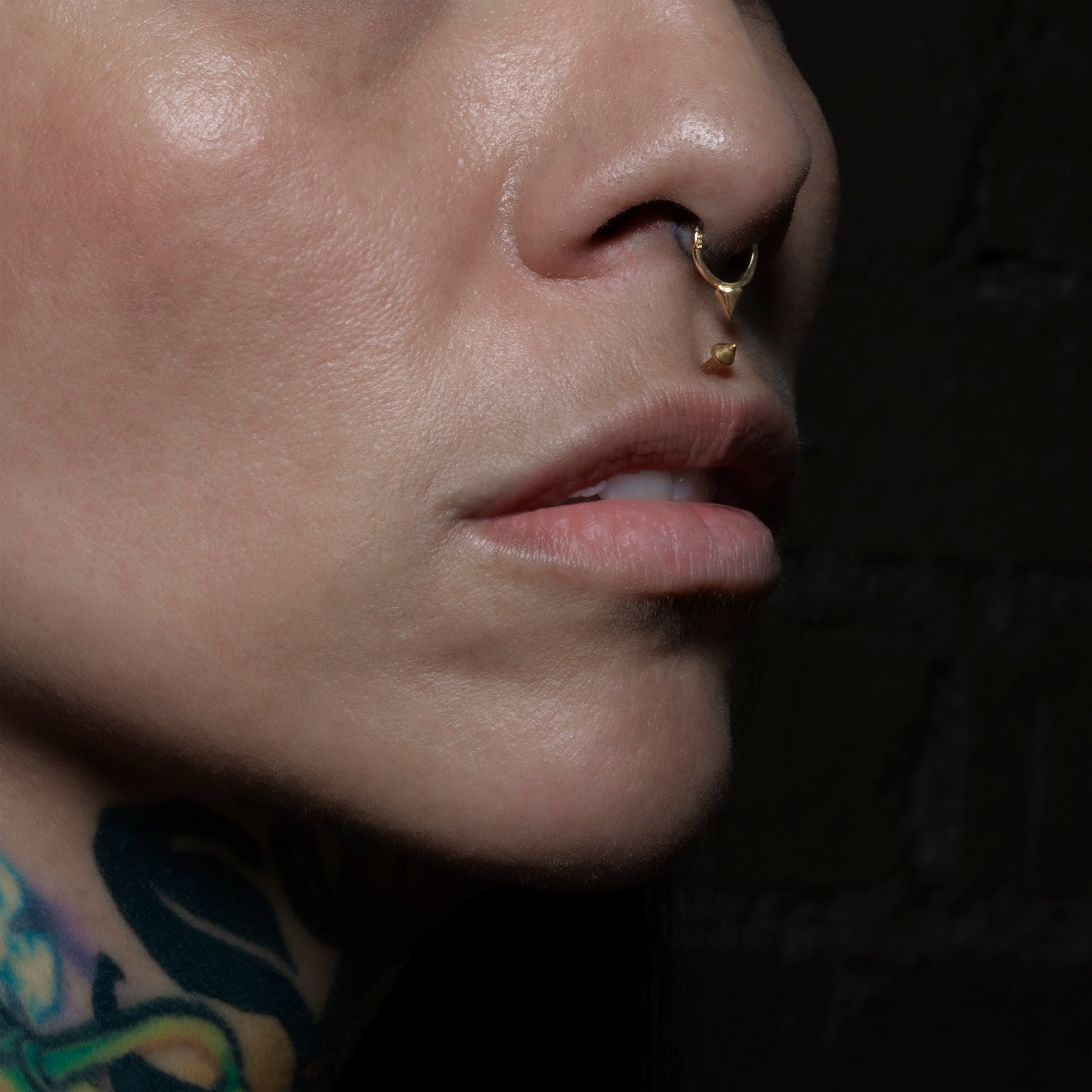 model wearing Golden Spike Labret