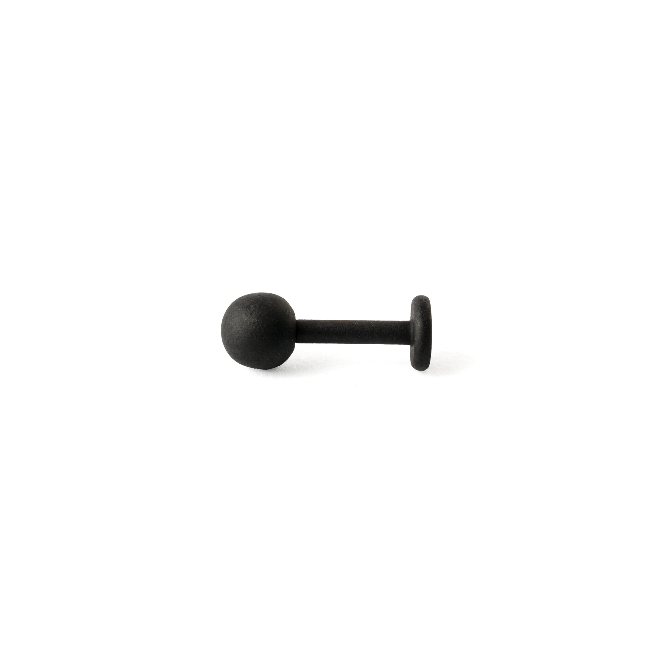 Black surgical steel Dot labret stud piercing side view