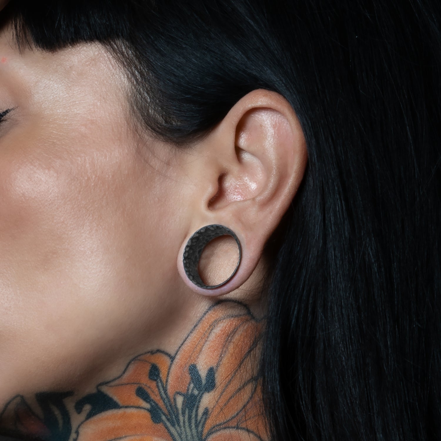 model wearing Hammered Black Silver Tunnel