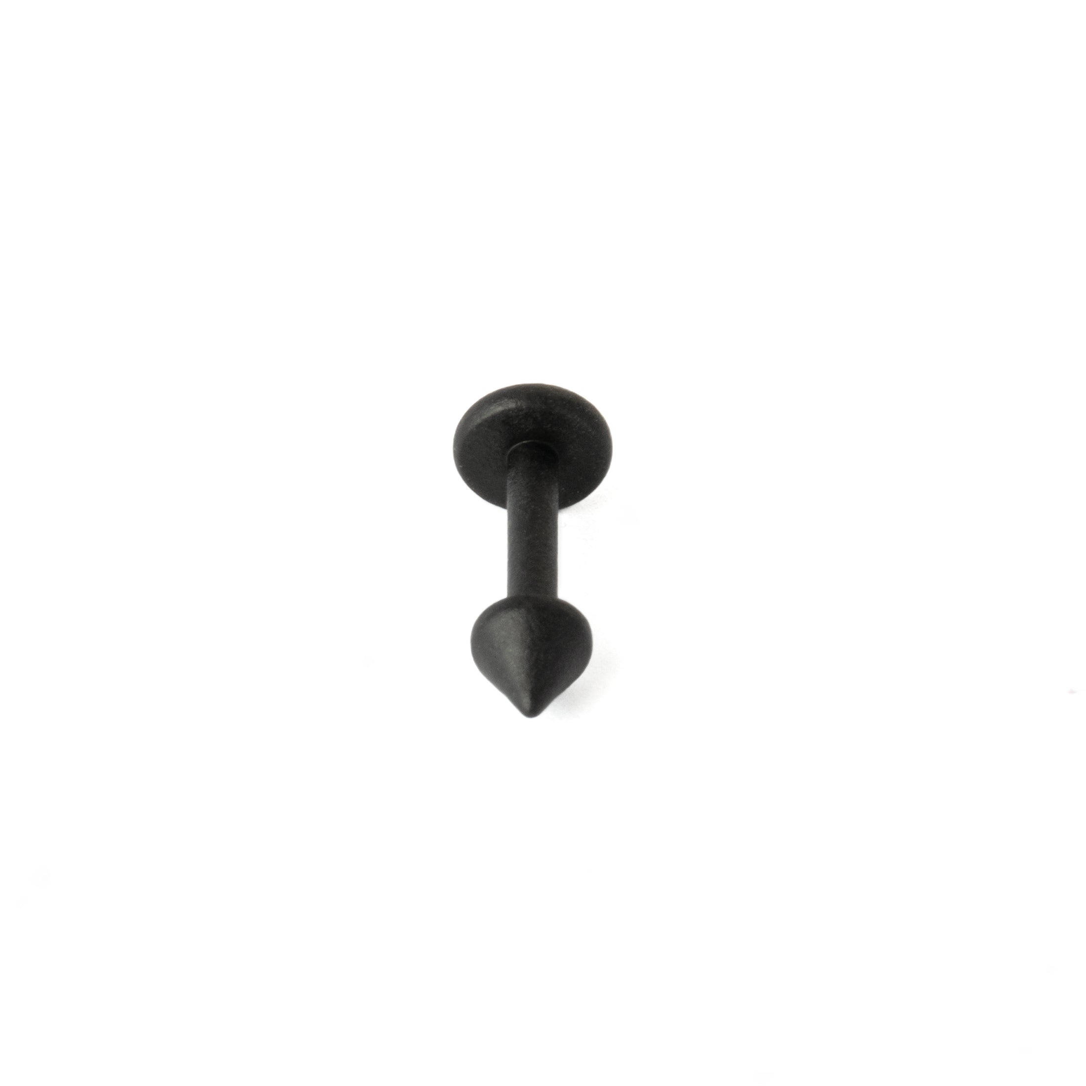 Black surgical steel spike labret stud piercing frontal view