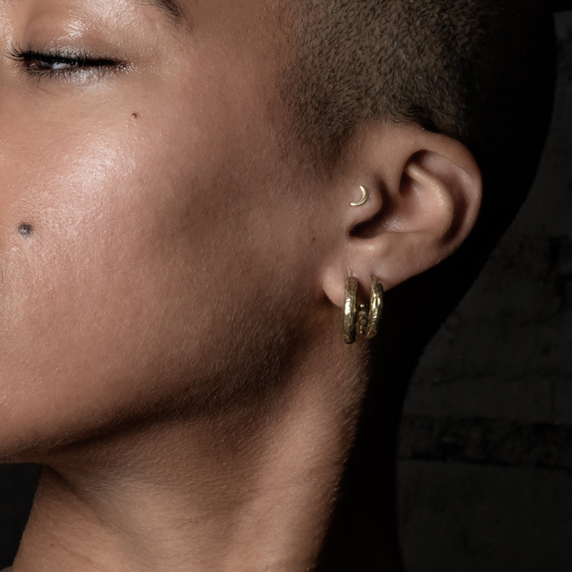 model wearing 18mm Hammered Brass Clicker Hoops earrings