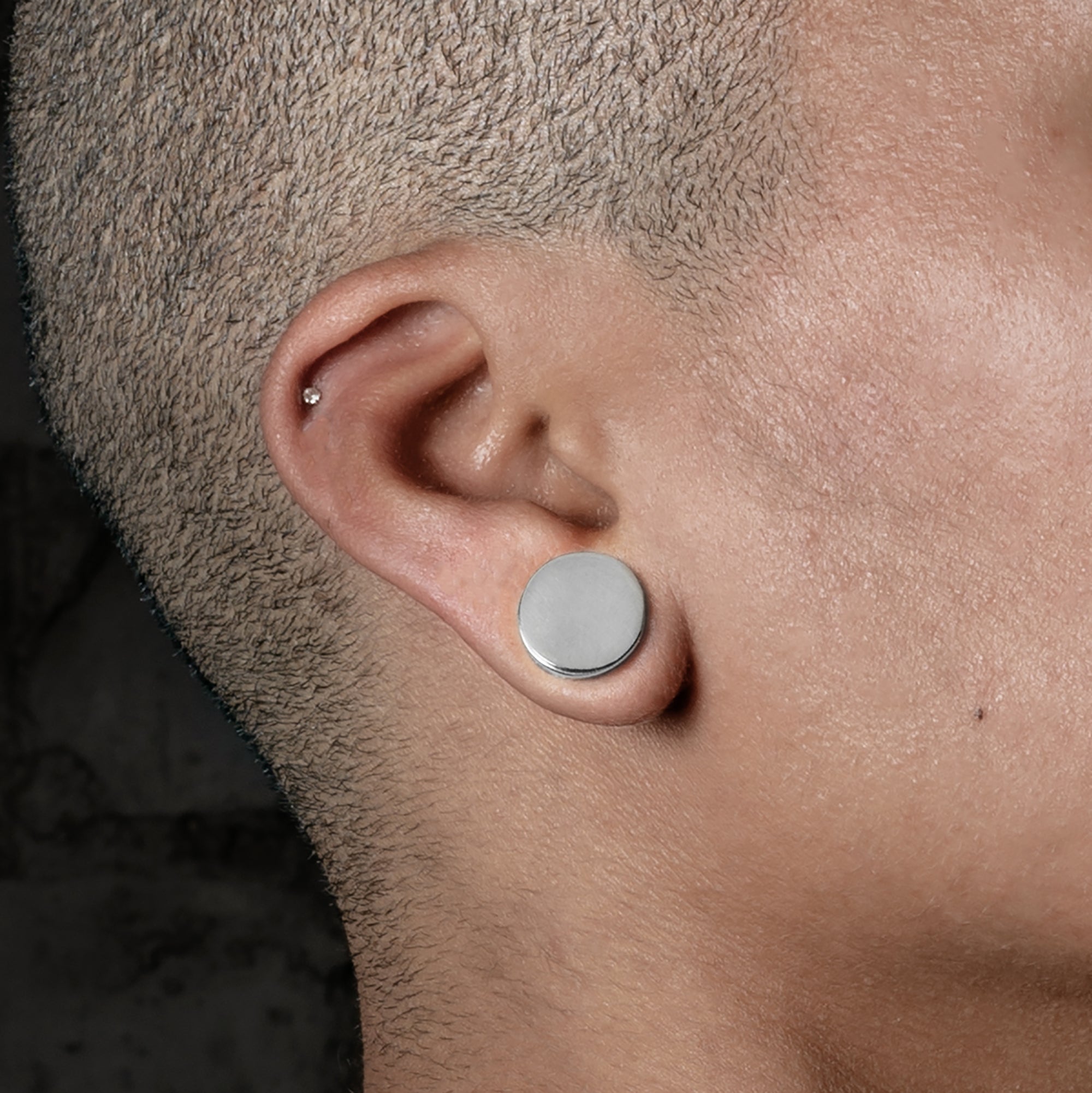 model wearing Plain Sterling Silver Plugs close up view