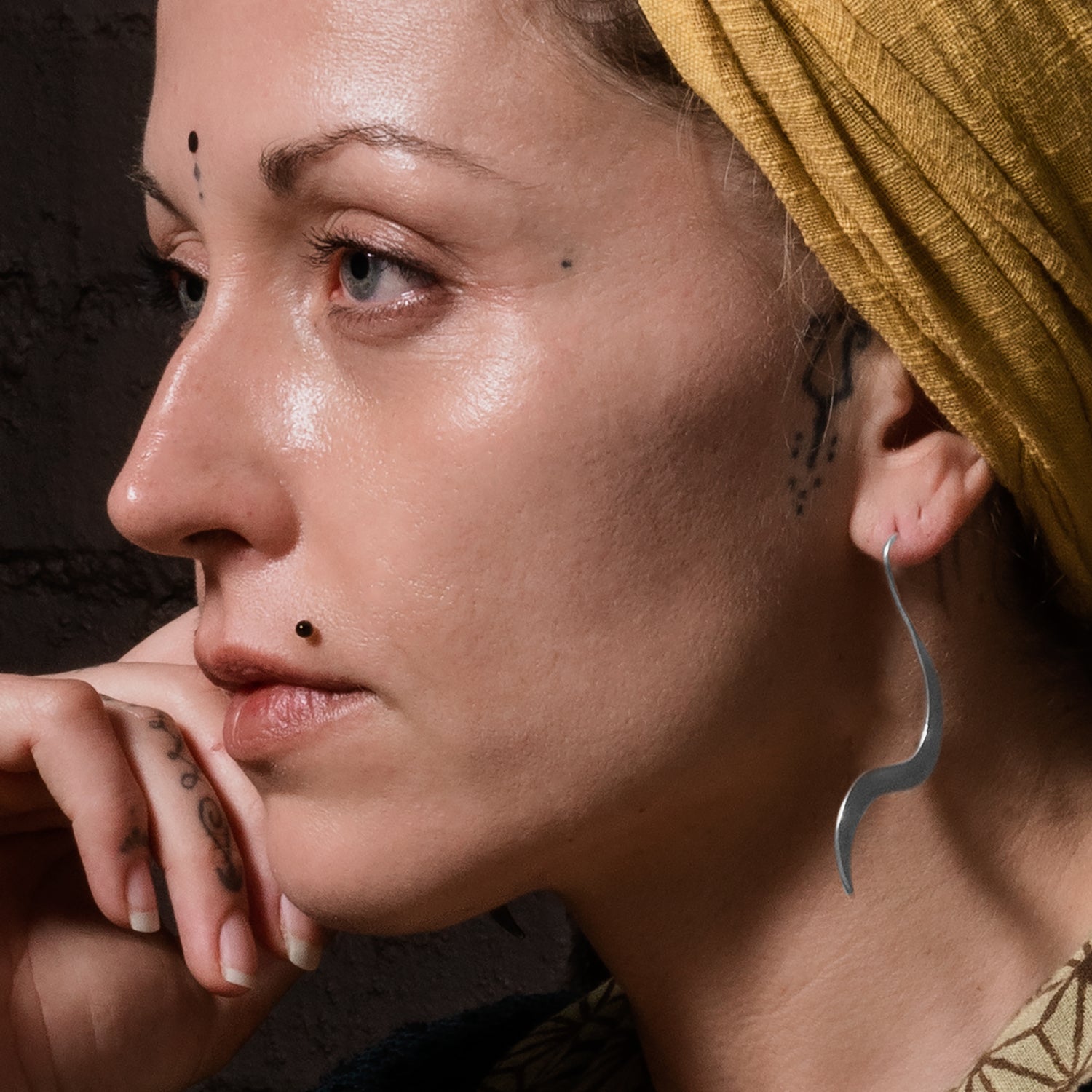 model wearing Silver Sway Earrings