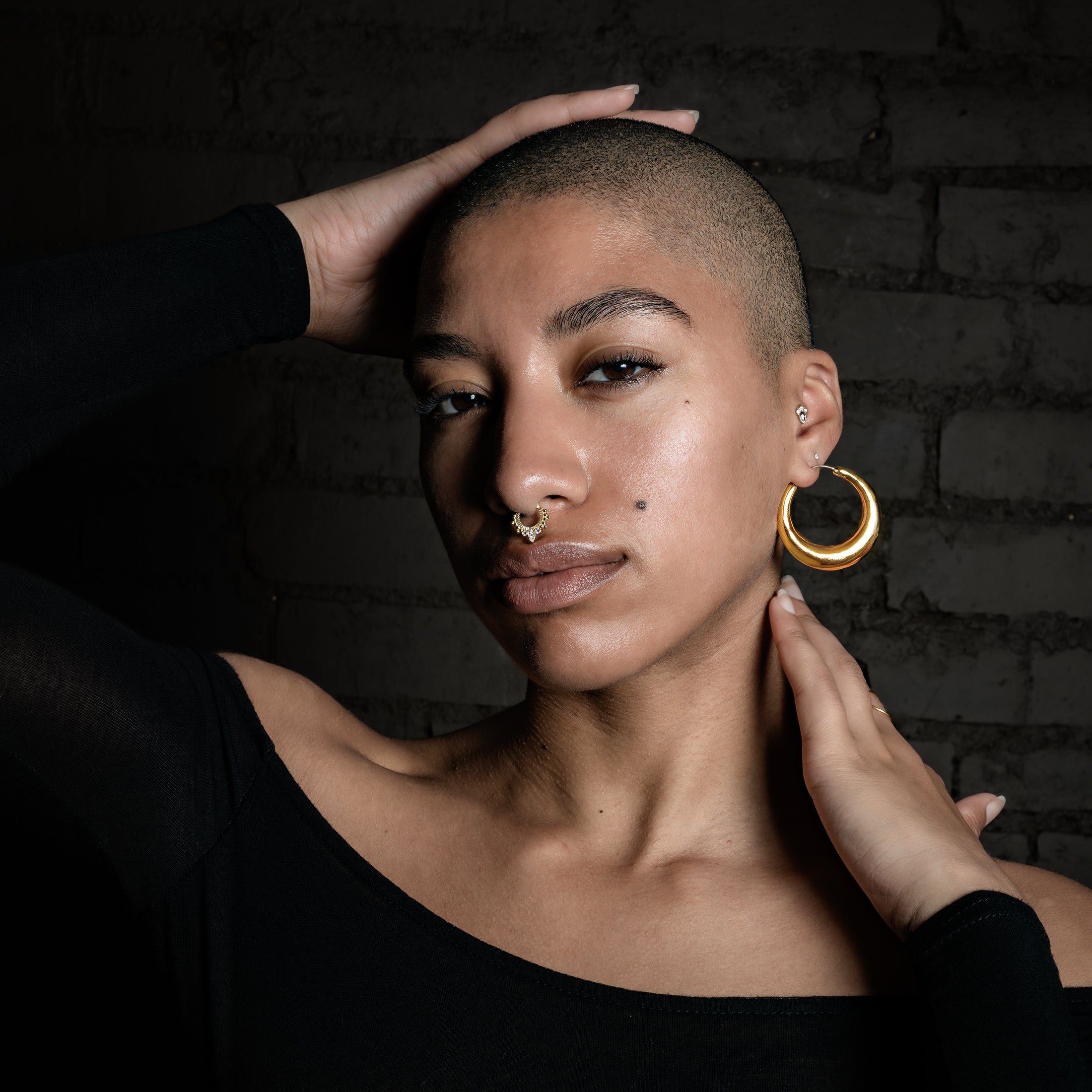 model wearing Golden Glow Hoop Earrings