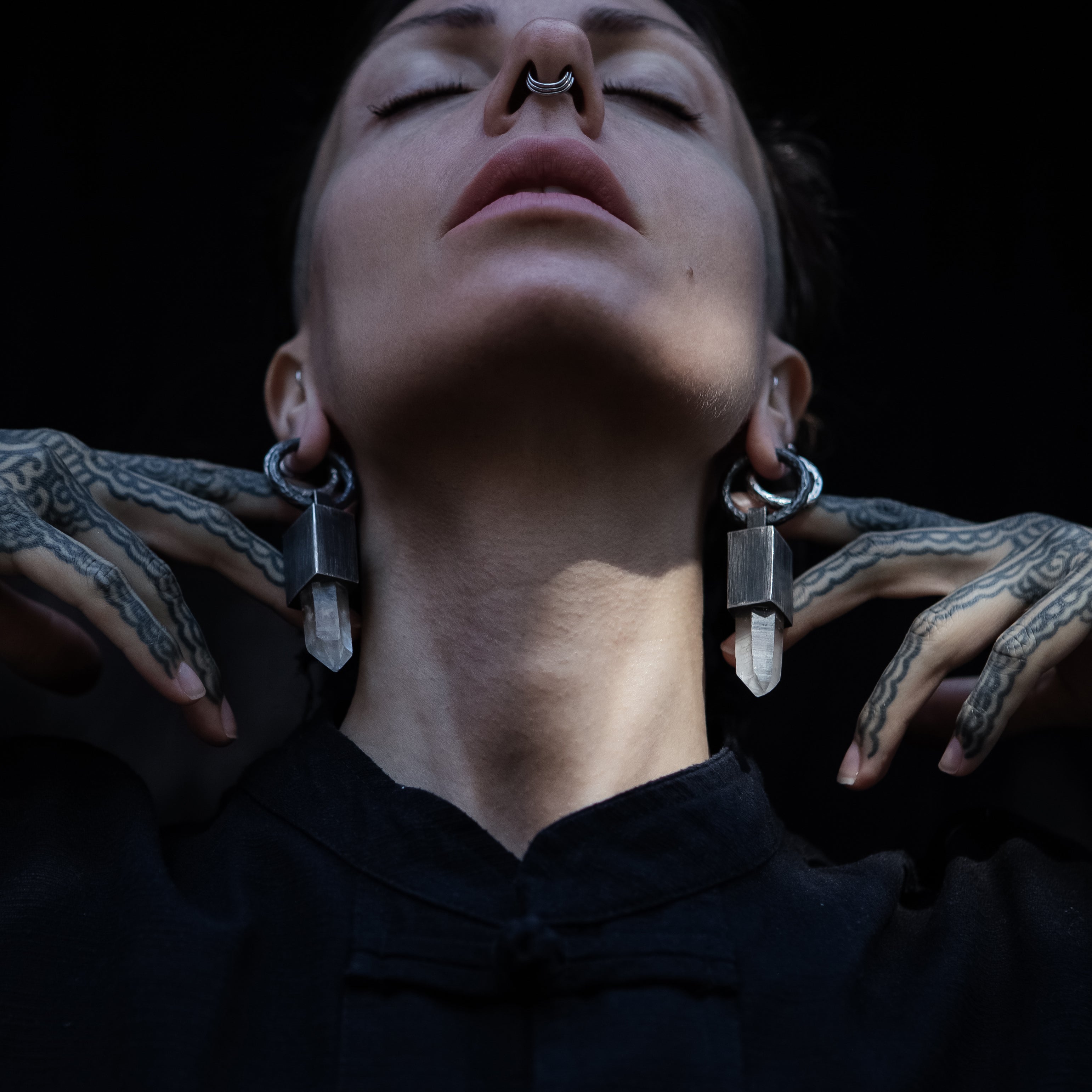 model wearing Black Silver Block Crystal Quartz drop Earrings