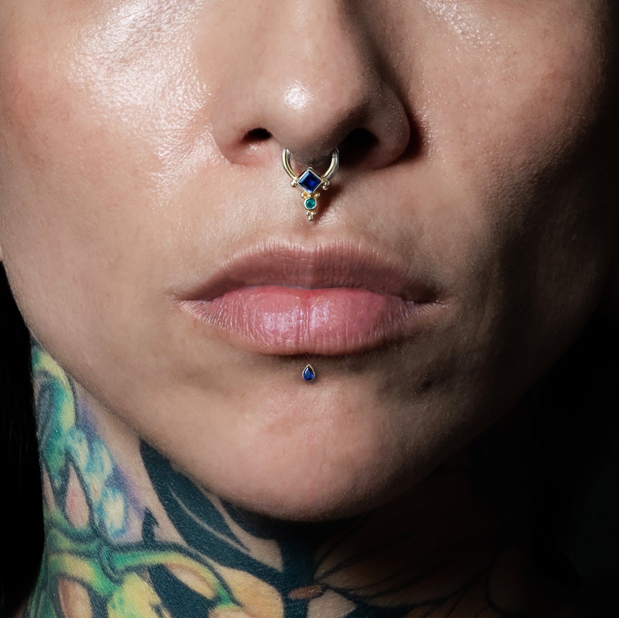 model wearing Rishi Gold Septum - Iolite and Green Onyx