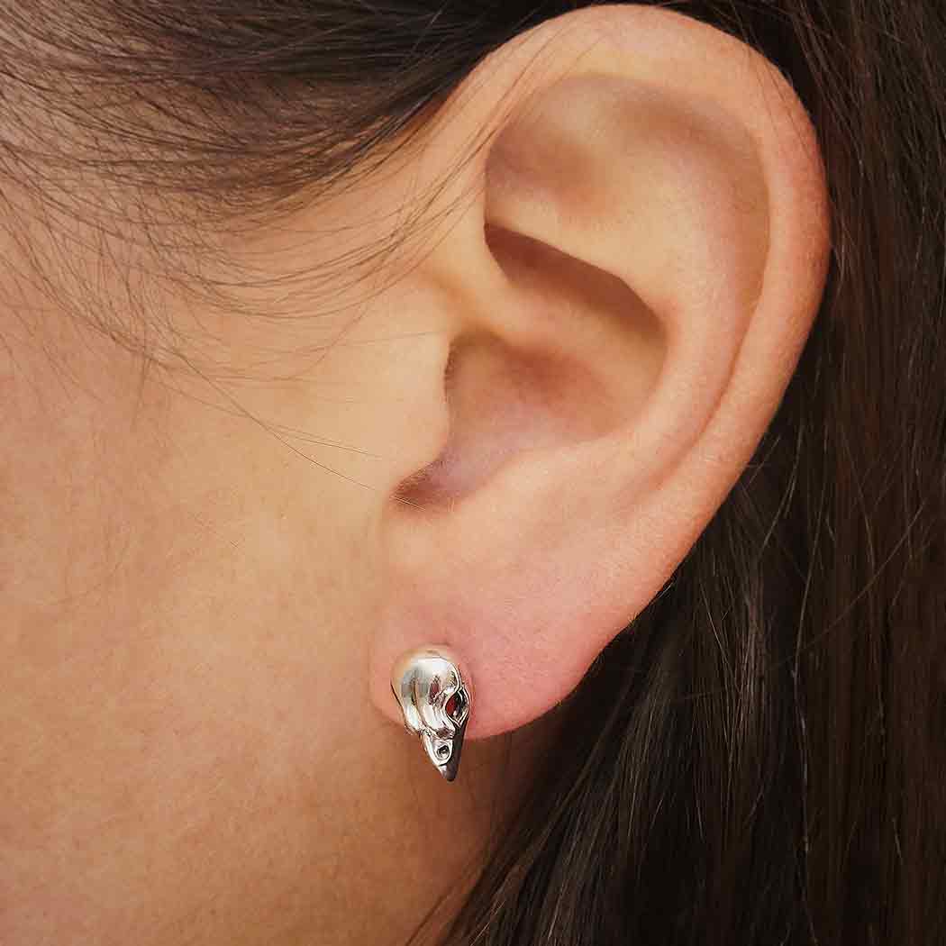 model wearing Sparrow Skull Silver Studs