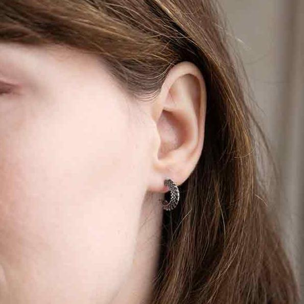 model wearing Sterling Silver Dragon Scale Open Hoop