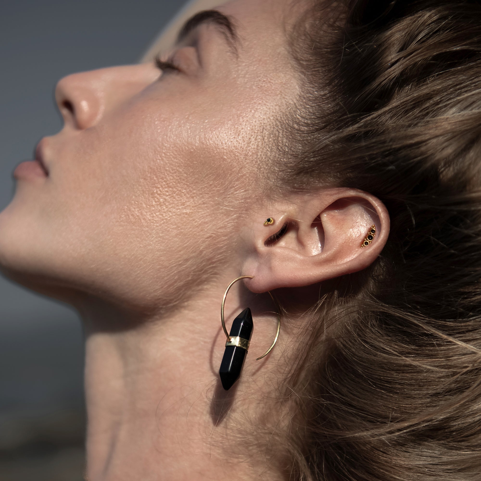 Zen Onyx Hoop Earrings_ear curation_1.jpg__PID:27eba4d1-11c6-4251-8e8d-253a38df8e05