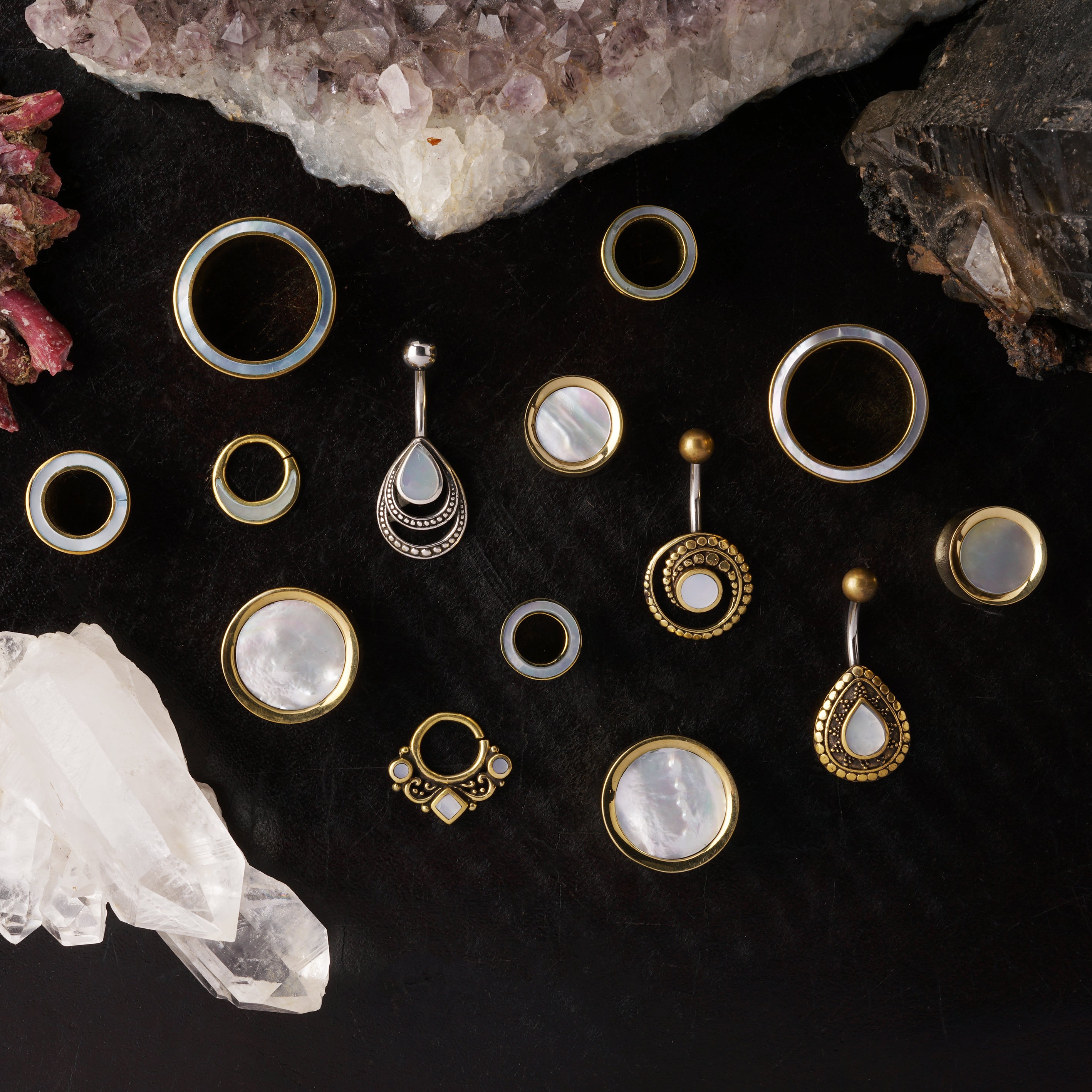 Golden Plugs with a Mother of Pearl