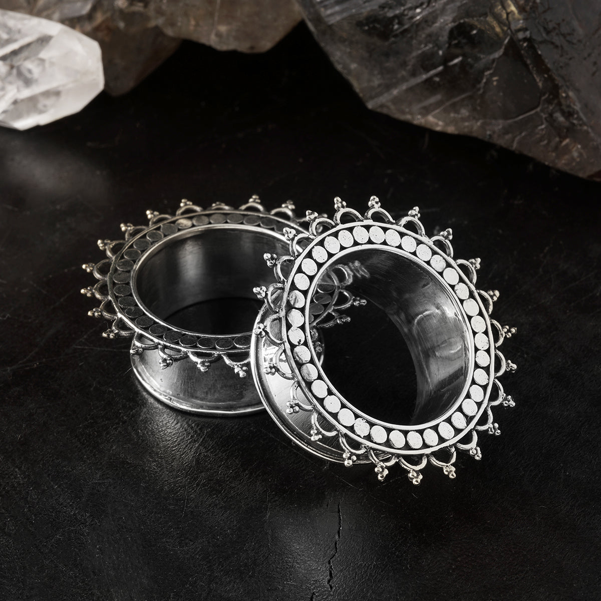 pair of silver tribal flower tara ear tunnels