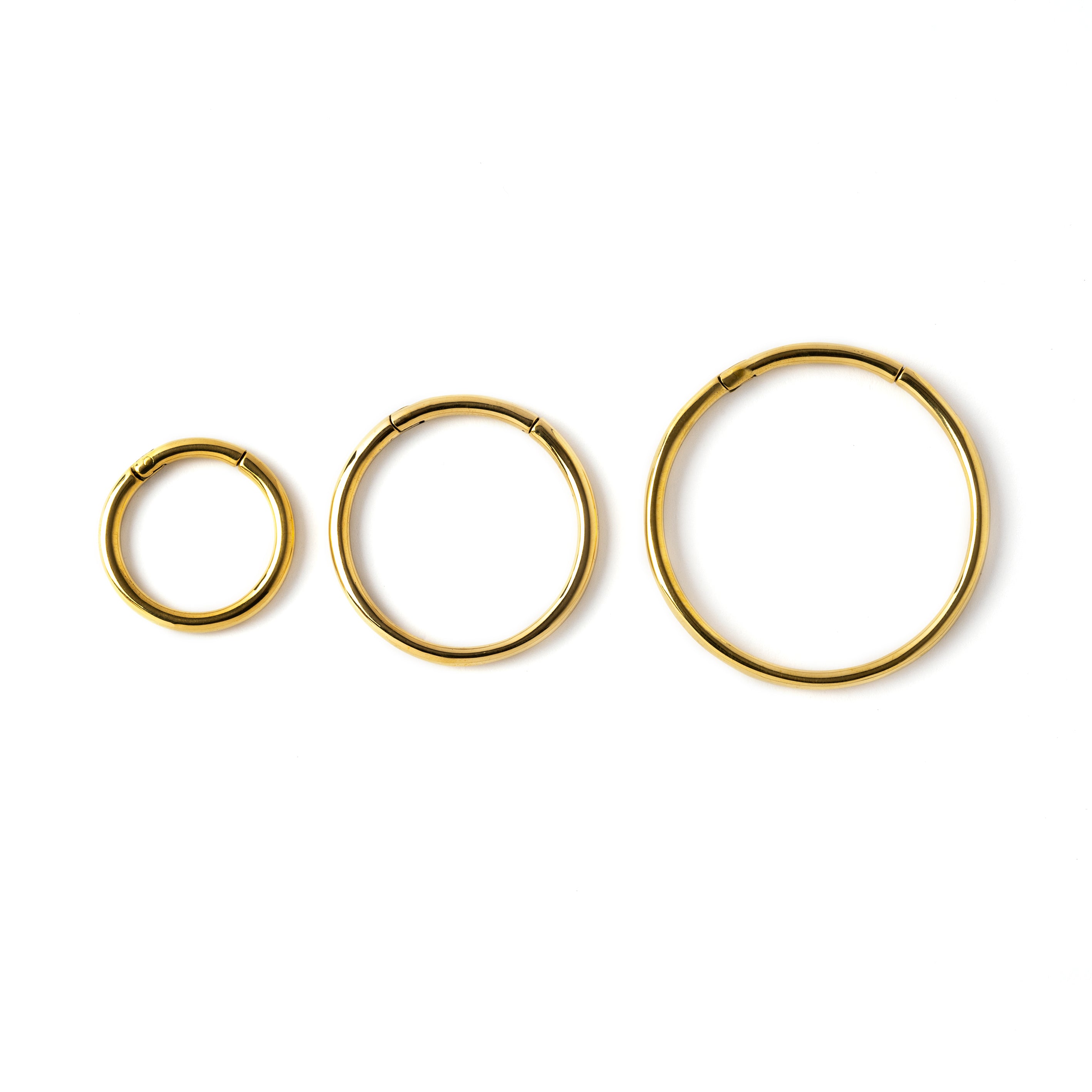 20mm, 30mm & 40 mm gold brass stacking hoop gauge earrings frontal view