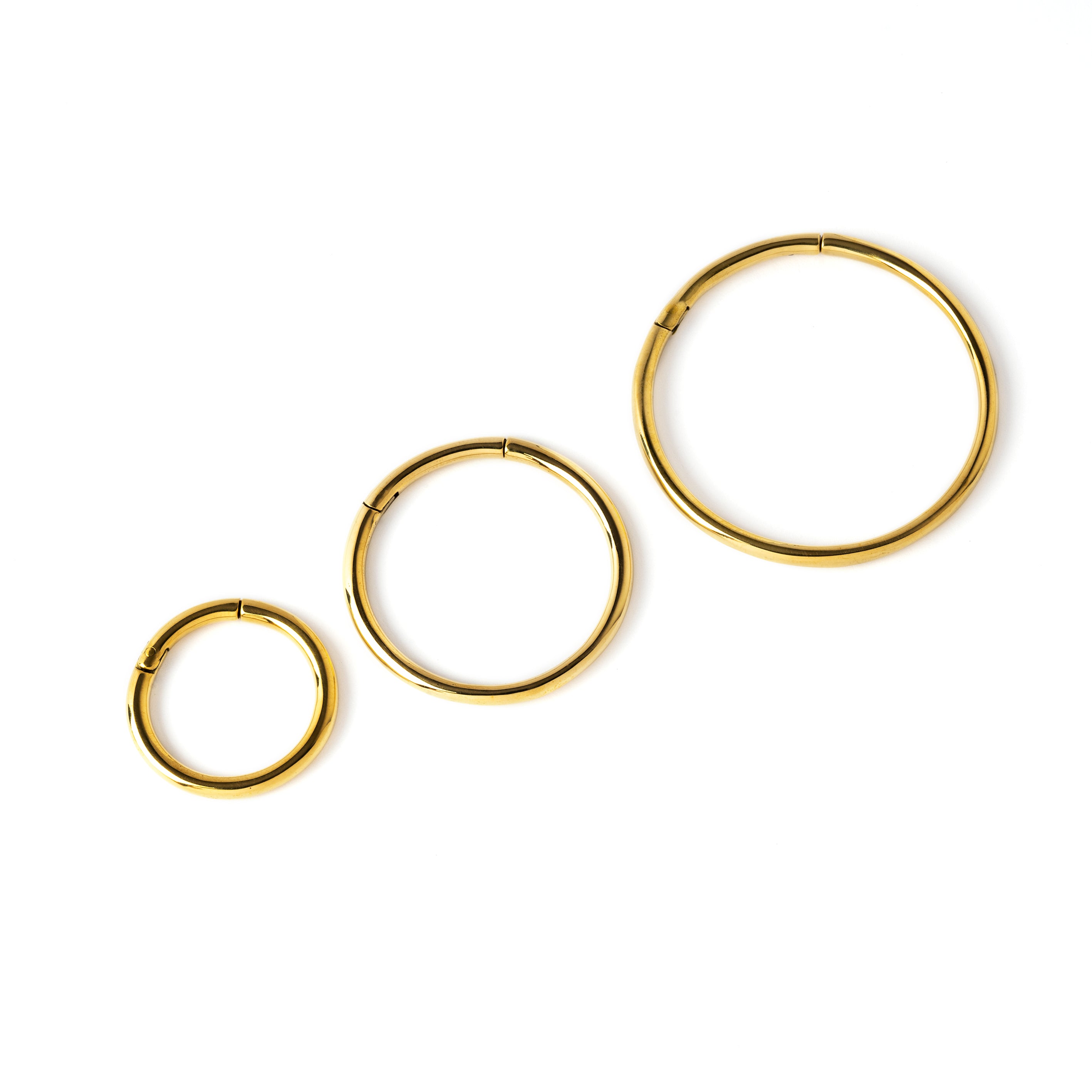 20mm, 30mm & 40 mm gold brass stacking hoop gauge earrings side view