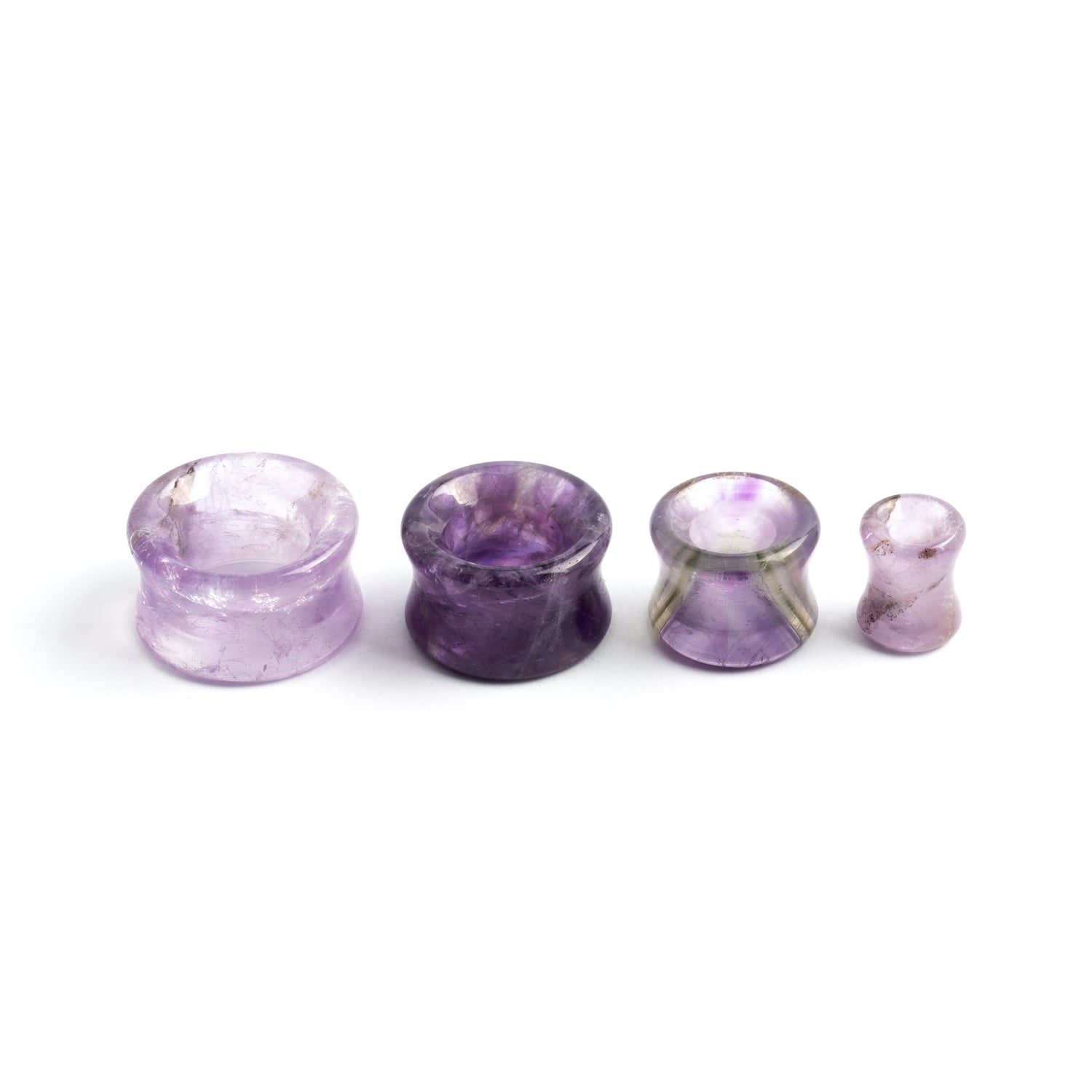 Amethyst Plug Tunnel | Tribu Londonseveral sizes of Amethyst double flare stone ear tunnel side view