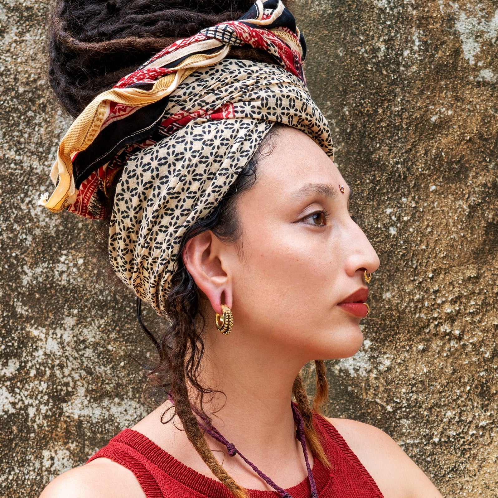 model wearing Orbit ear weights hoops hangers for stretched ears 2g