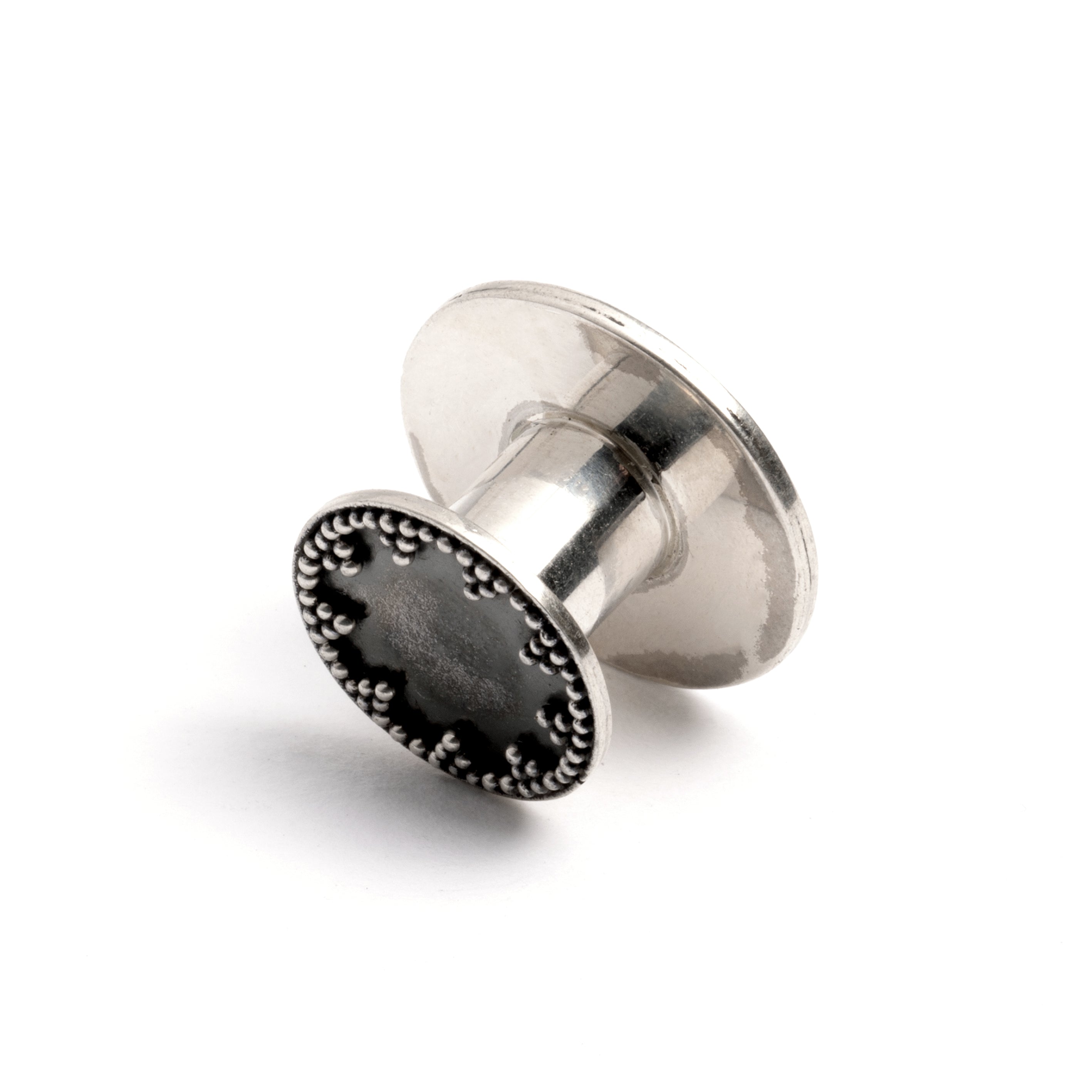 single Antique Silver Plug Tunnel with star ornament and a screw on closure back view