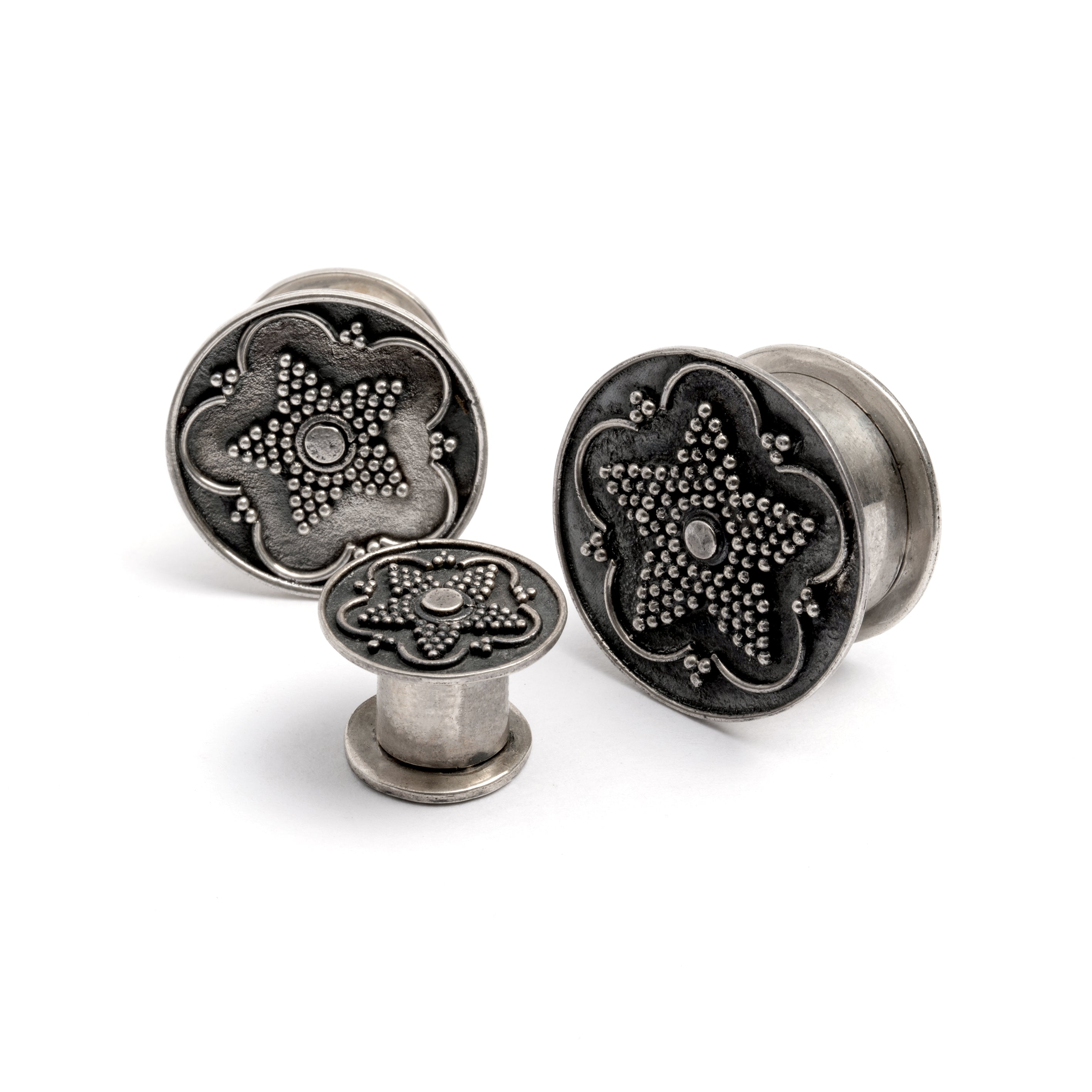 different sizes of Antique Silver Plug Tunnel with star ornament and a screw on closure