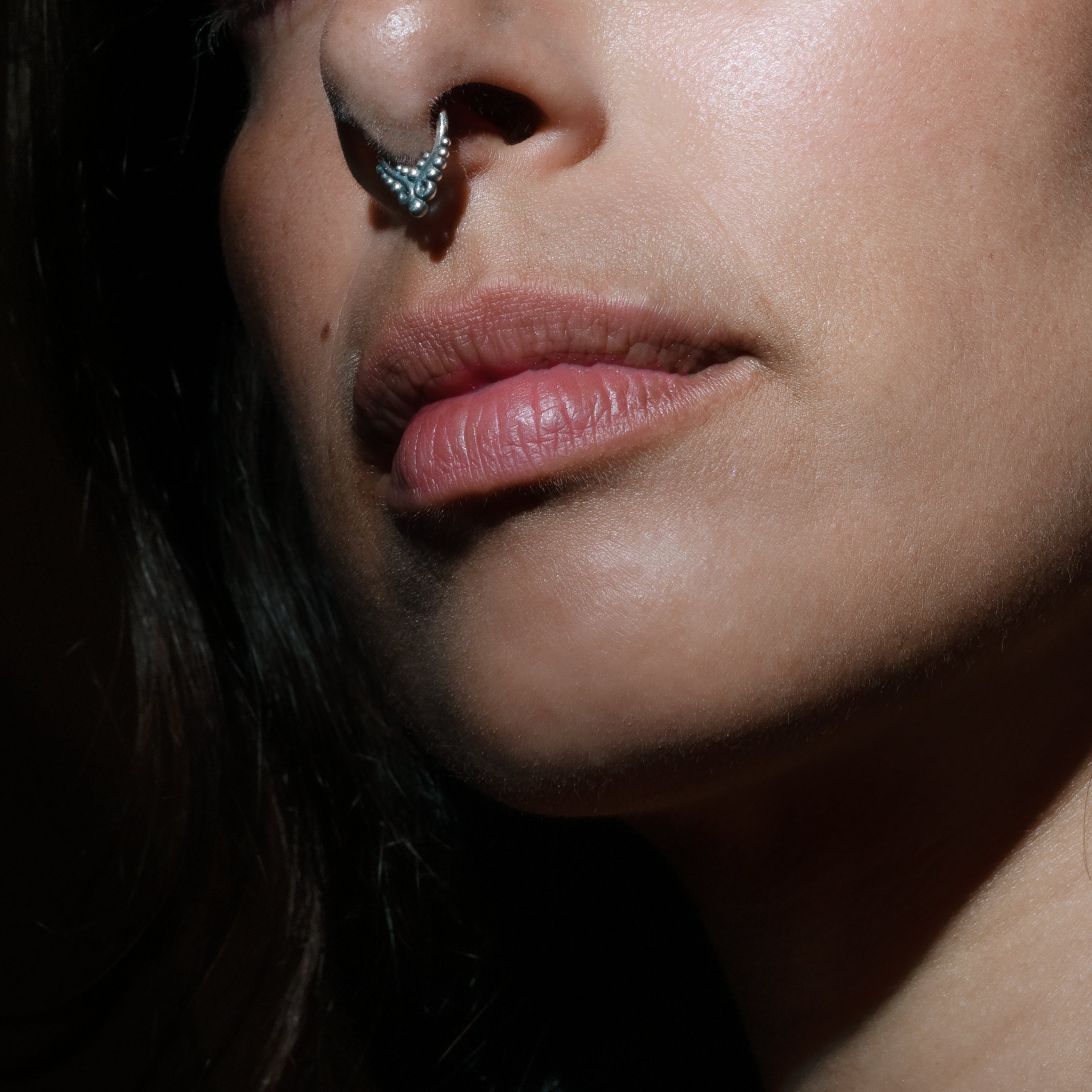 model wearing Asmara Silver Septum Ring