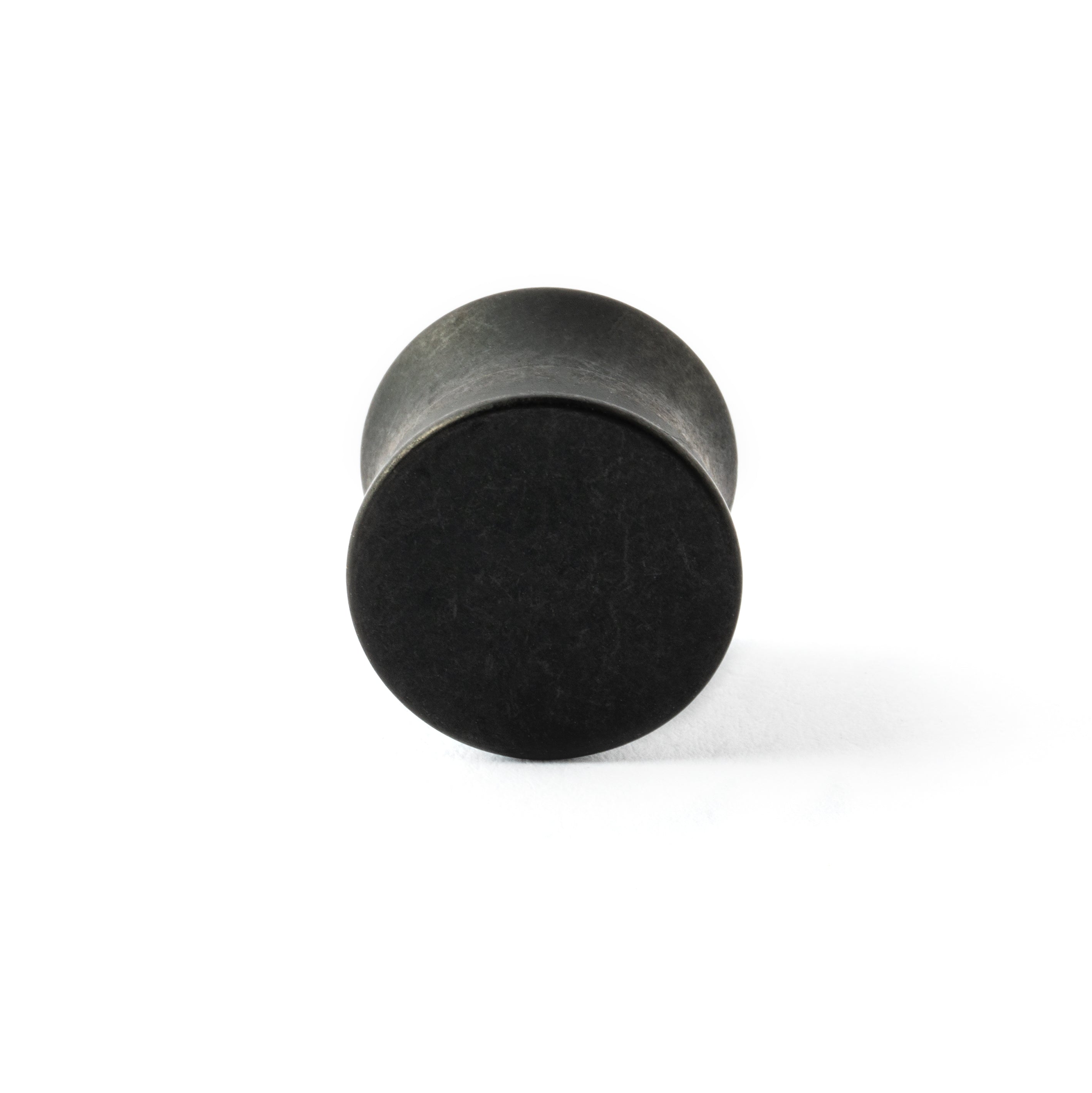 single surgical steel black steel plug with double flared ends frontal view