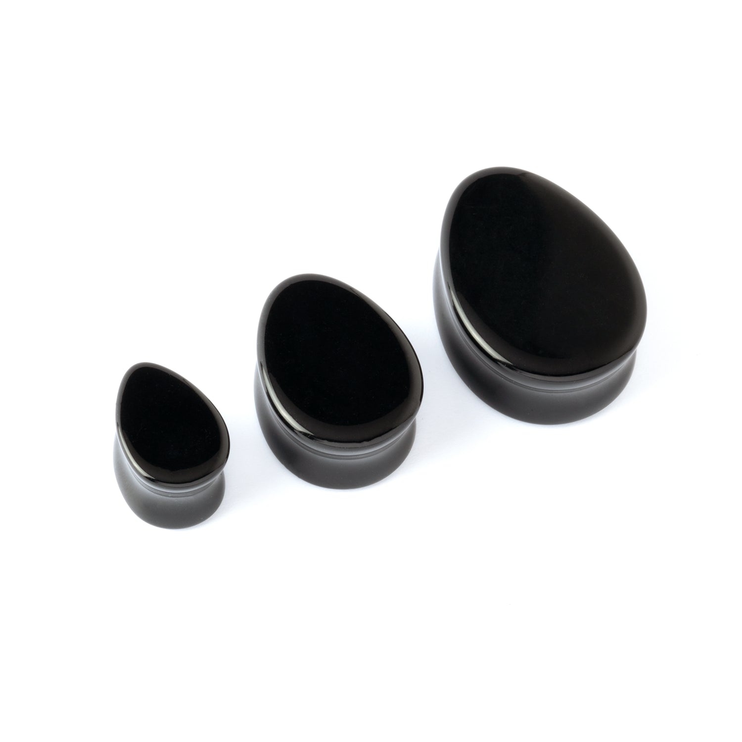 three sizes black Agate teardrop plugs with double flared ends side view