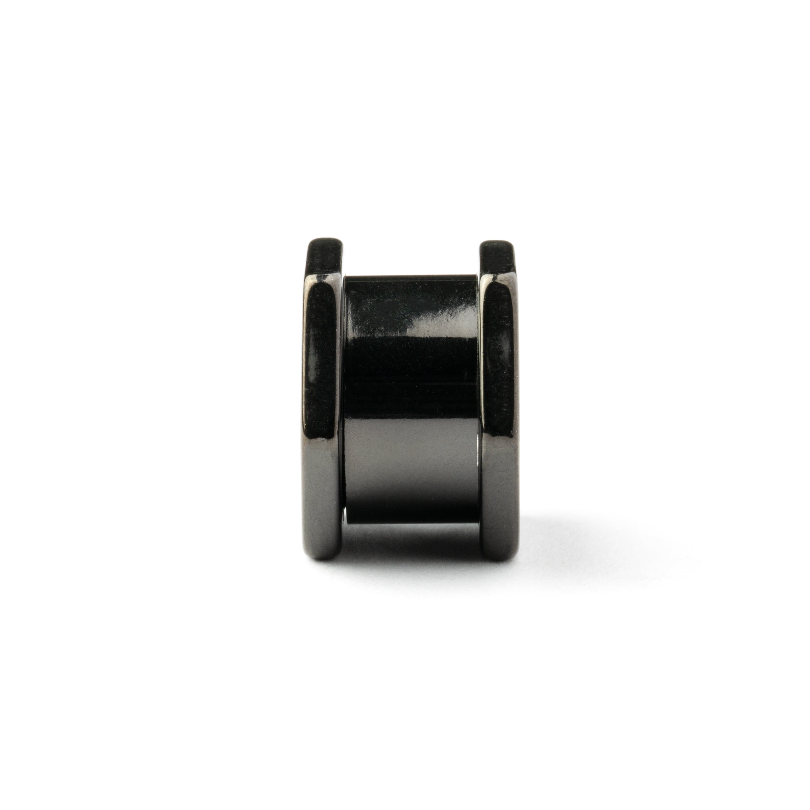 single surgical steel black hexagon ear tunnel side view