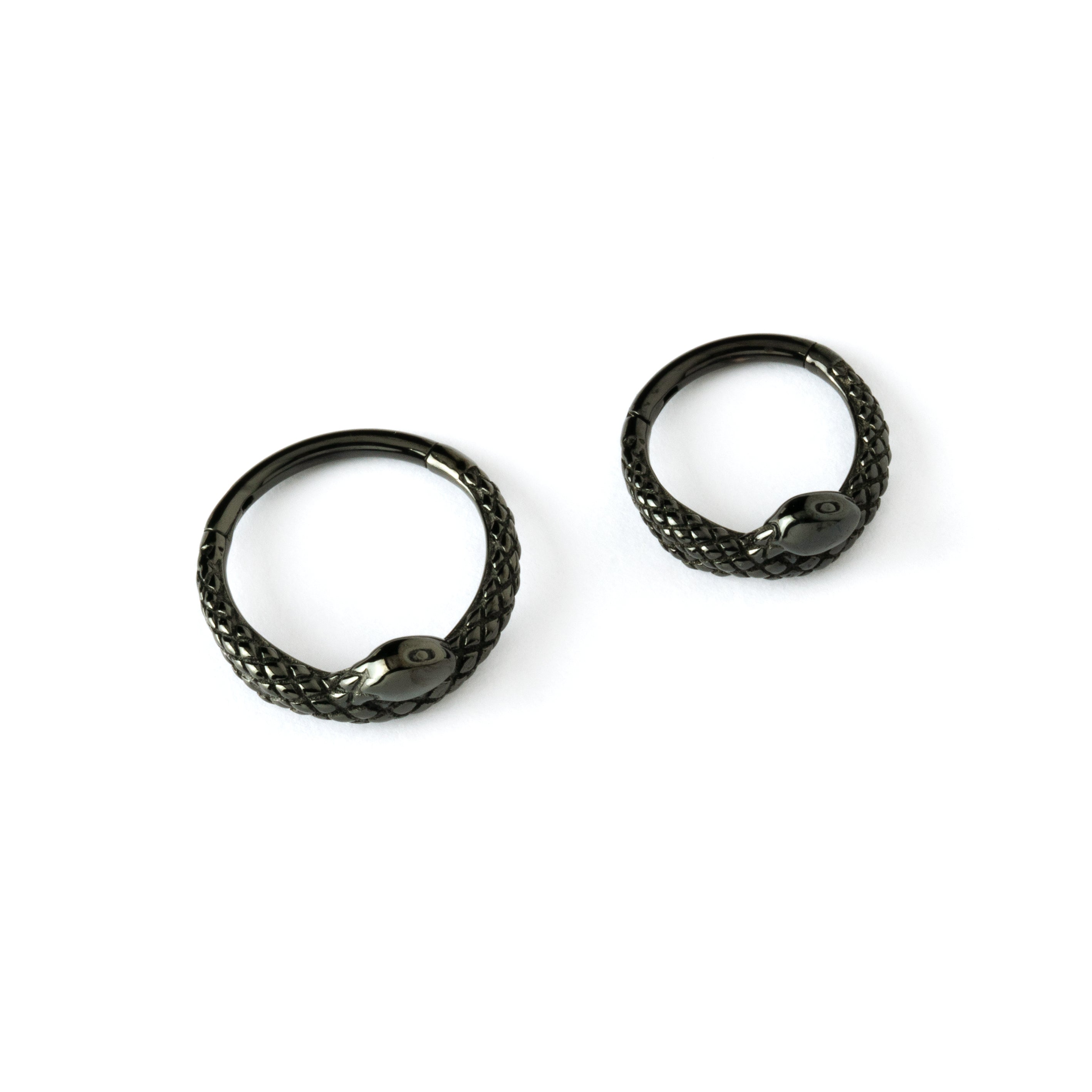 8mm and 10mm shiny black surgical steel snake piercing clicker rings frontal view