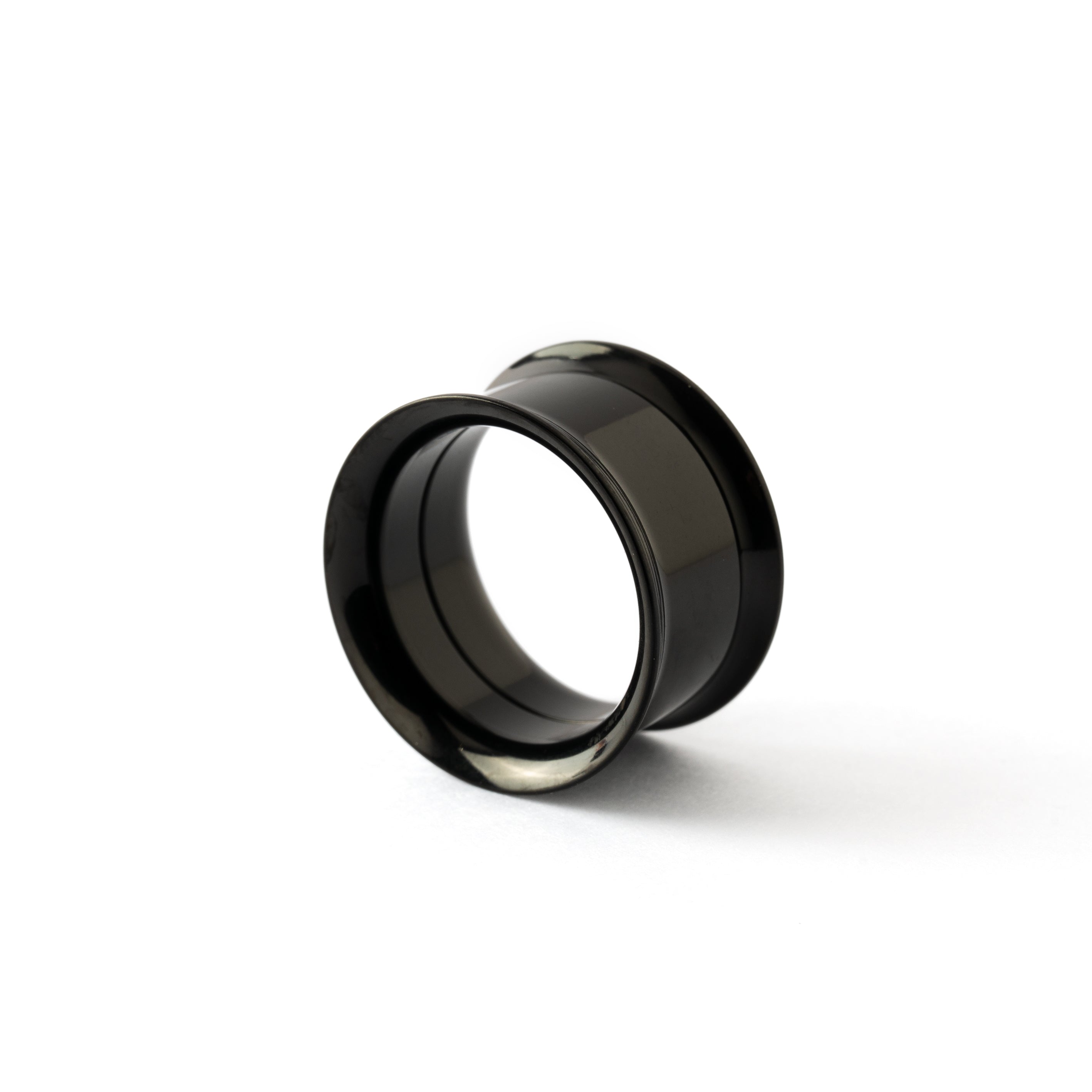 shiny black surgical steel plug tunnel with screw back closure side view