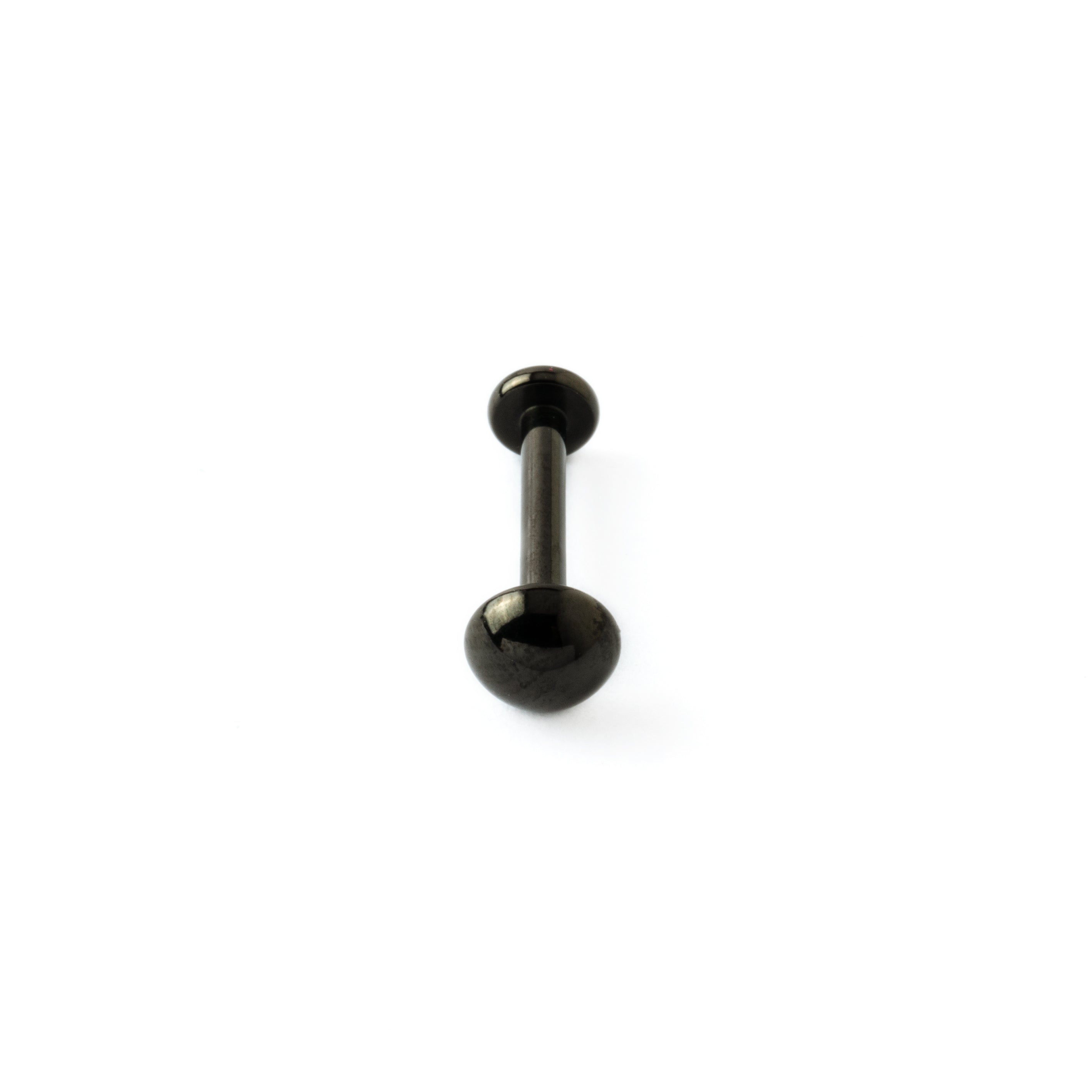 black dot labret frontal view