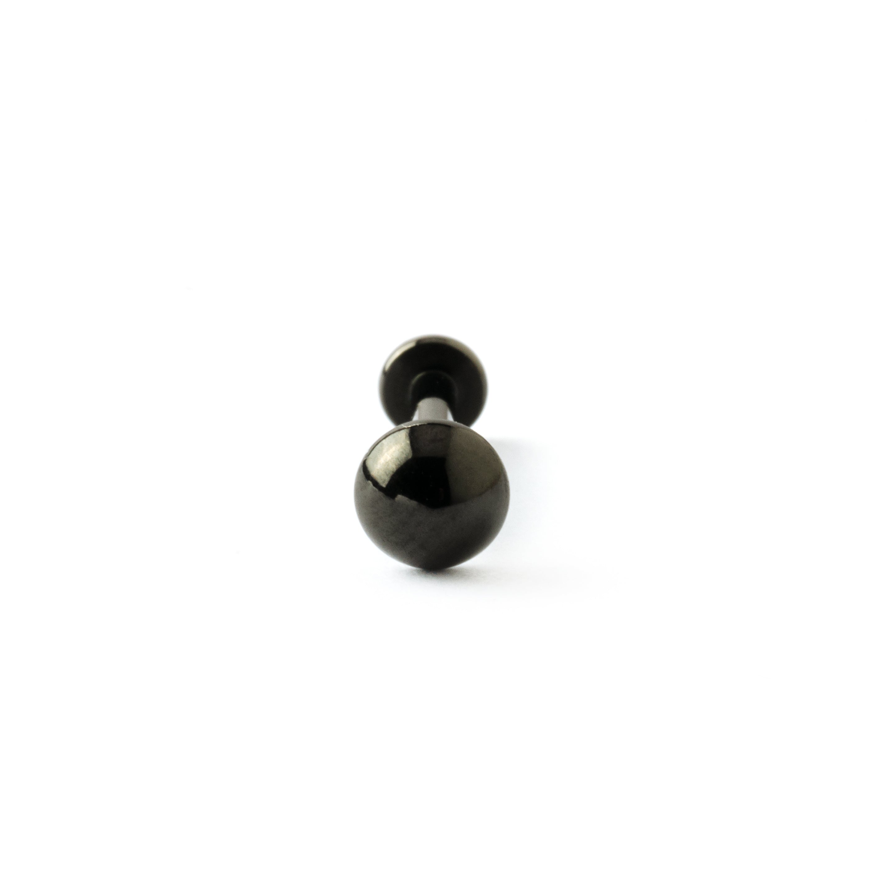 black dot labret frontal close up view