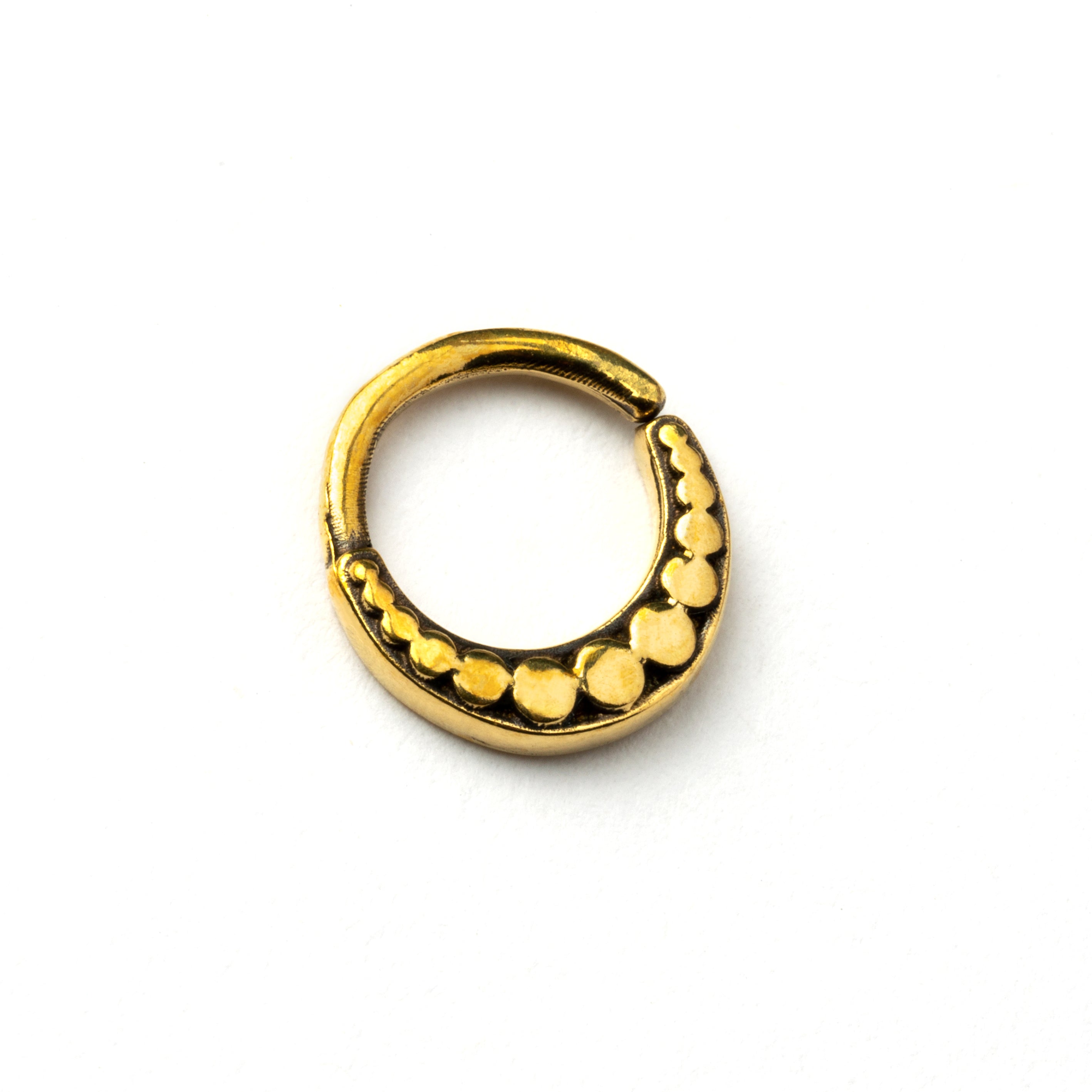 Dayak golden brass septum ring left side view