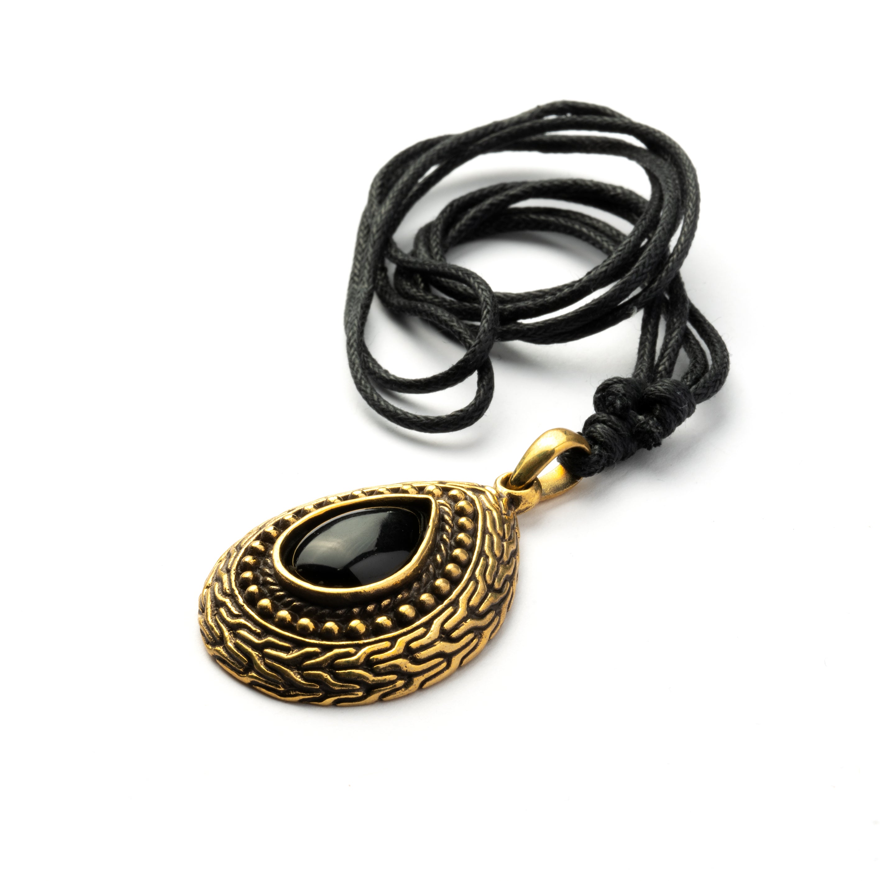 Teardrop shaped pendant with black Onyx stone encircled by Celtic ornaments. Black Onyx is a crystal to guide your spiritual journey by bringing the true reflection of your soul. Material: Brass, Black Onyx Nickel, cadmium and lead free. Dimension: H 40mm , W 30mm Comes on an adjustable black cotton string.