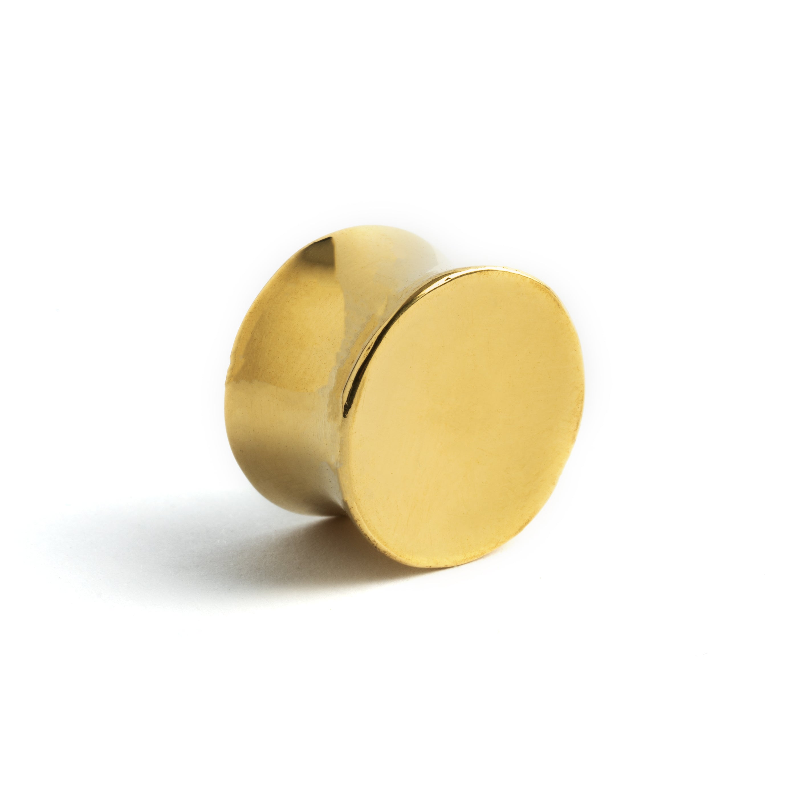 single golden brass ear plug with abalone inlay back view
