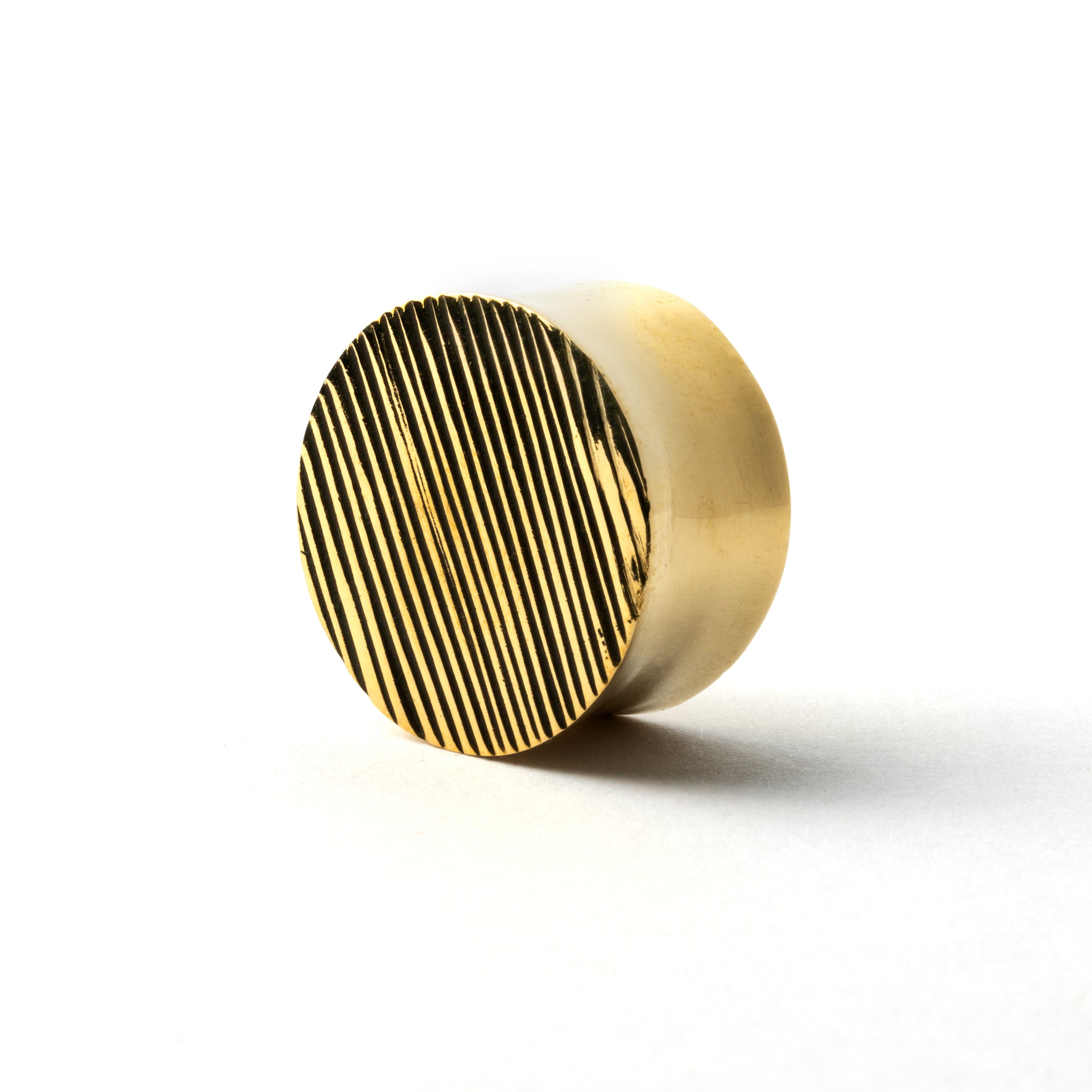 golden brass scratched plug earring left side view