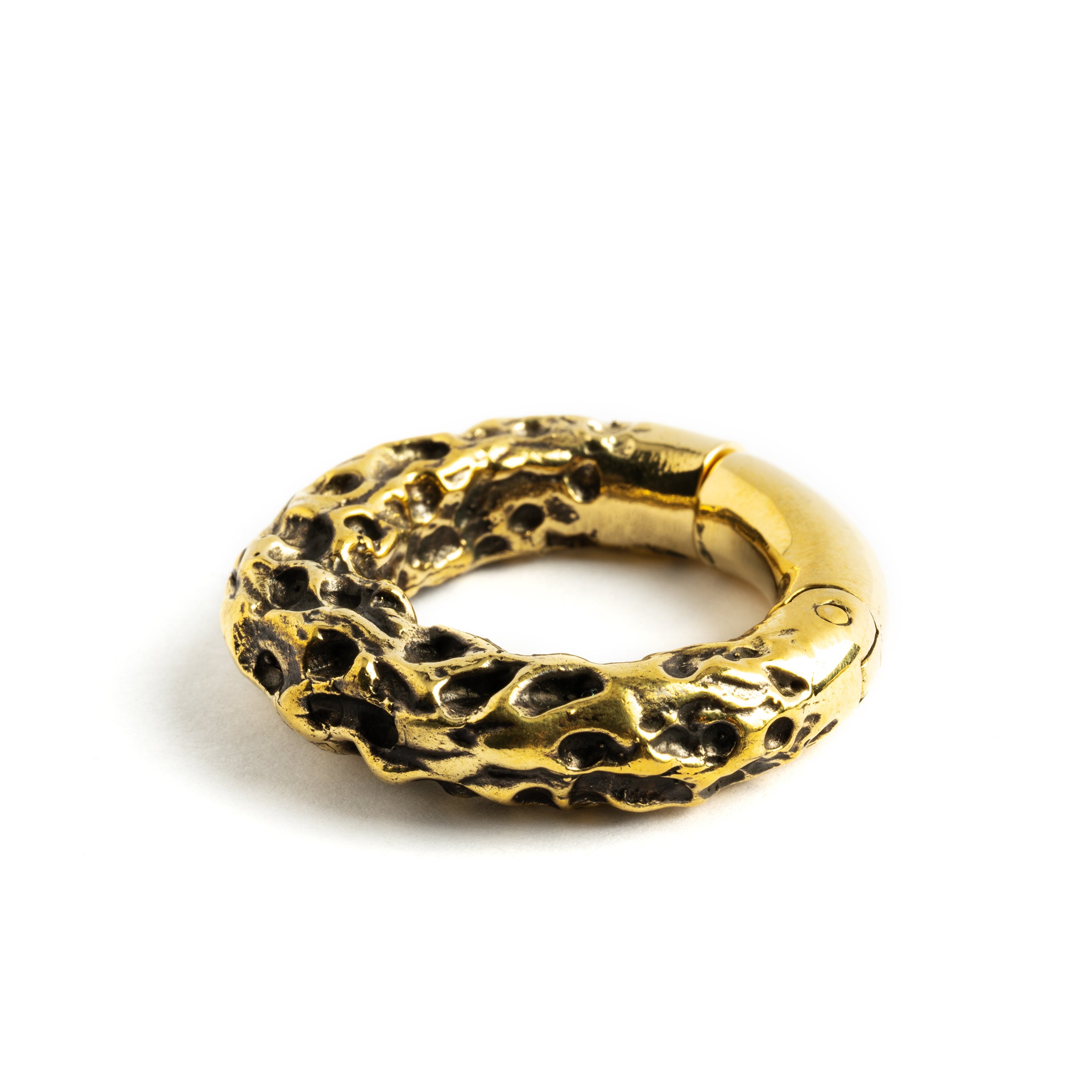 single gold brass hoop hanger with rocky texture side close up view