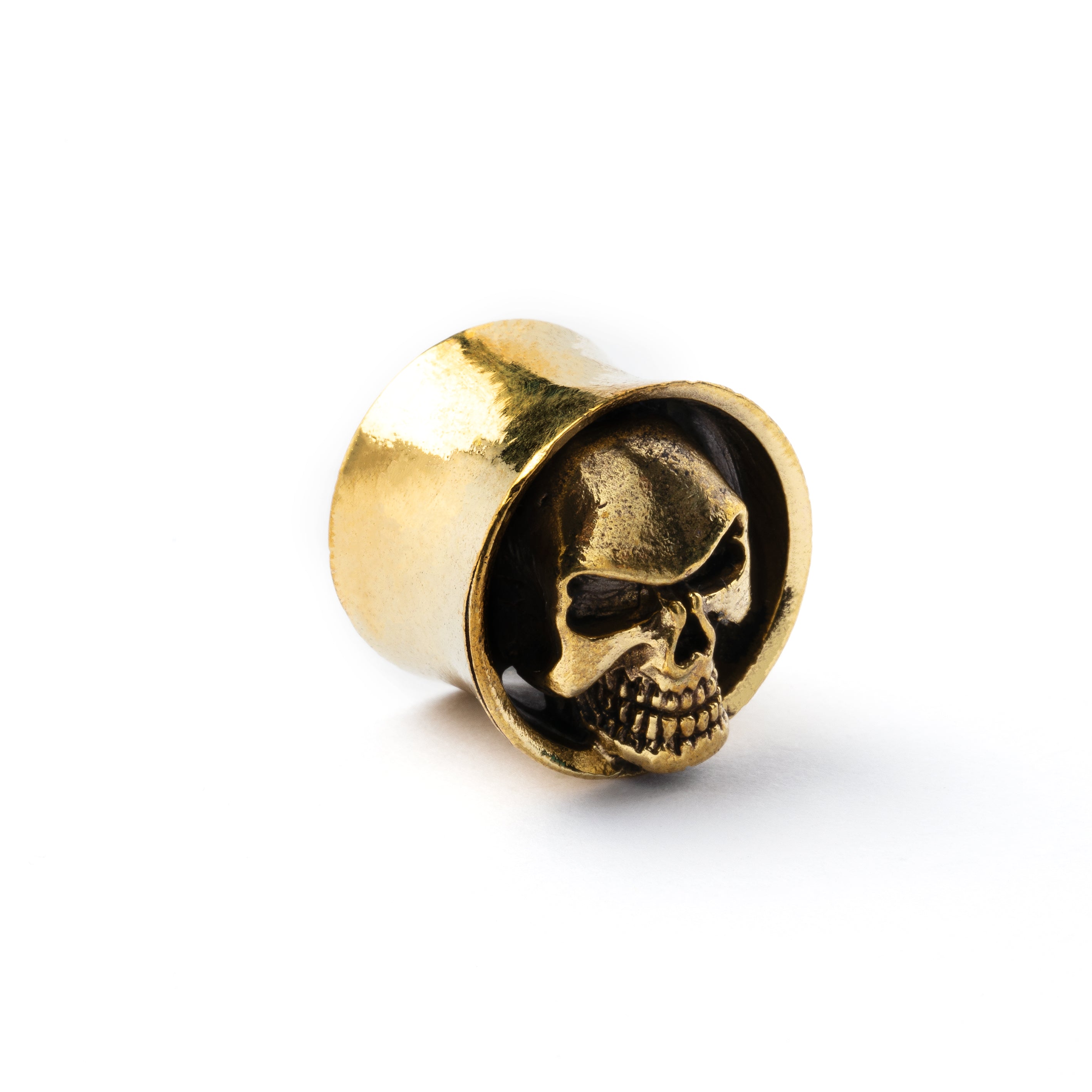 Brass skull ear plug left side view