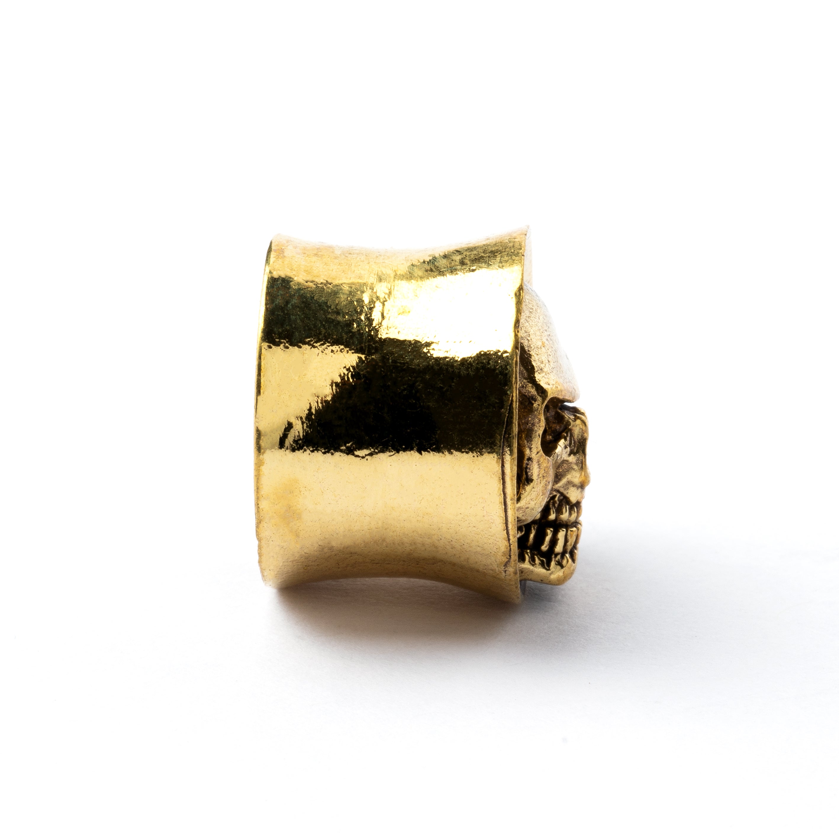 Brass skull ear plug side view