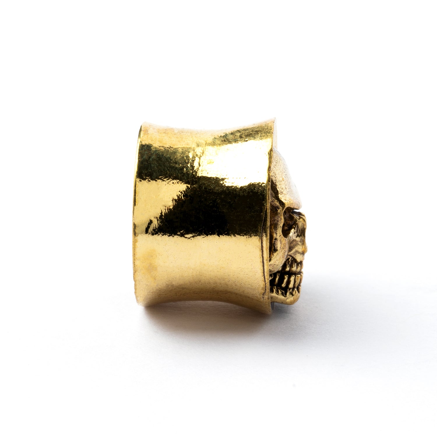 Brass skull ear plug side view