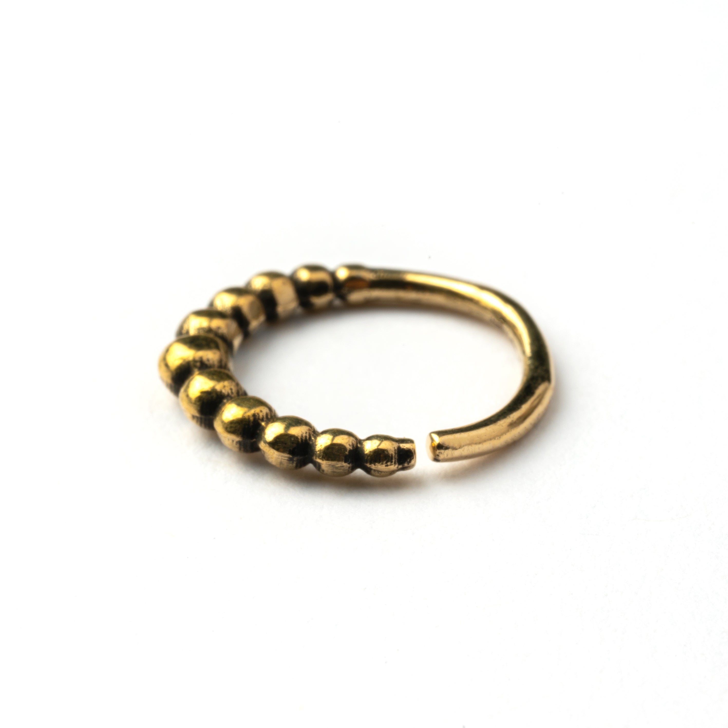 Mouji golden brass septum ring side view