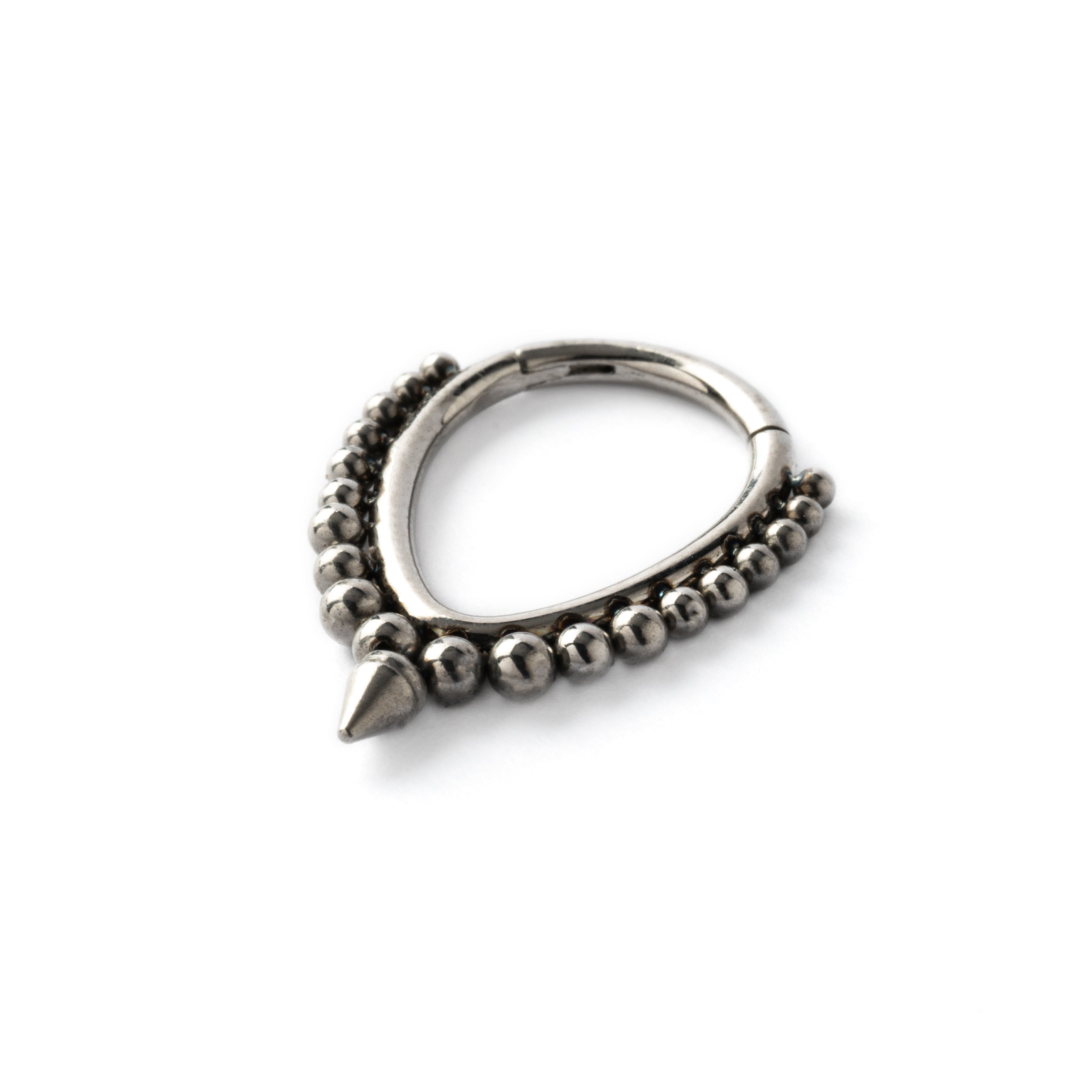surgical steel teardrop septum clicker with spheres and spiky drop left side view