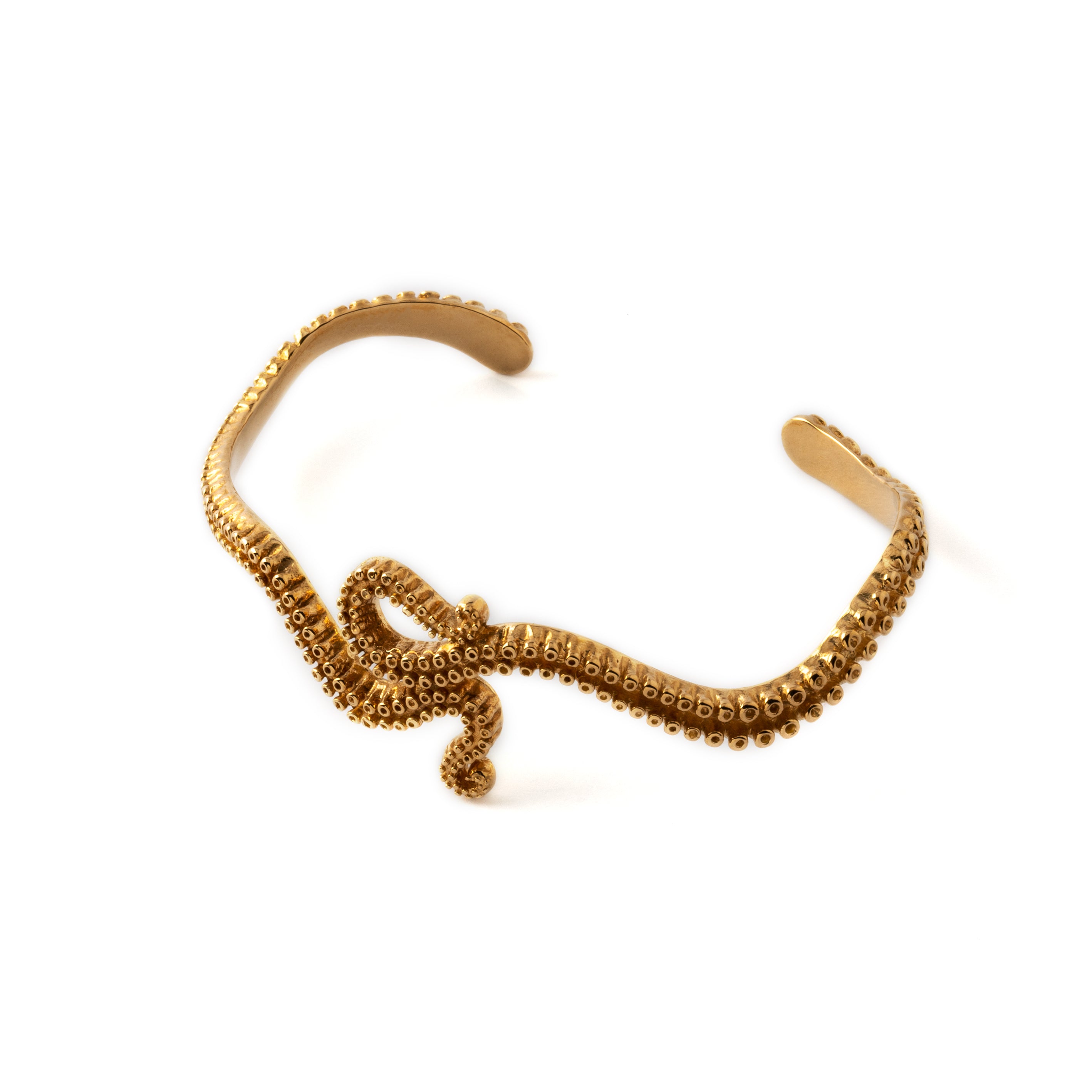 Bronze octopus tentacle bangle above side view
