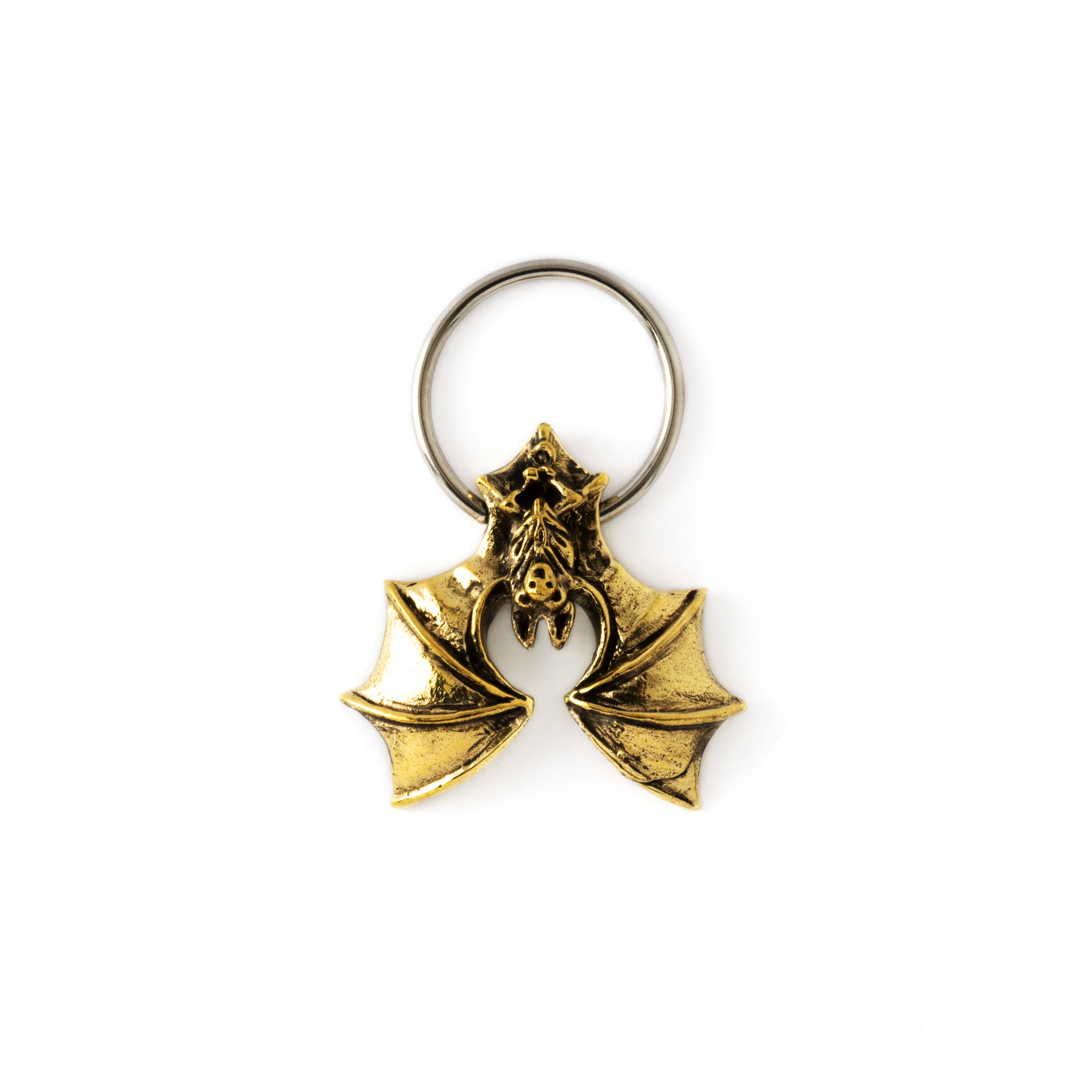 surgical steel piercing ring finely with detailed antique gold colour bat ornament frontal view