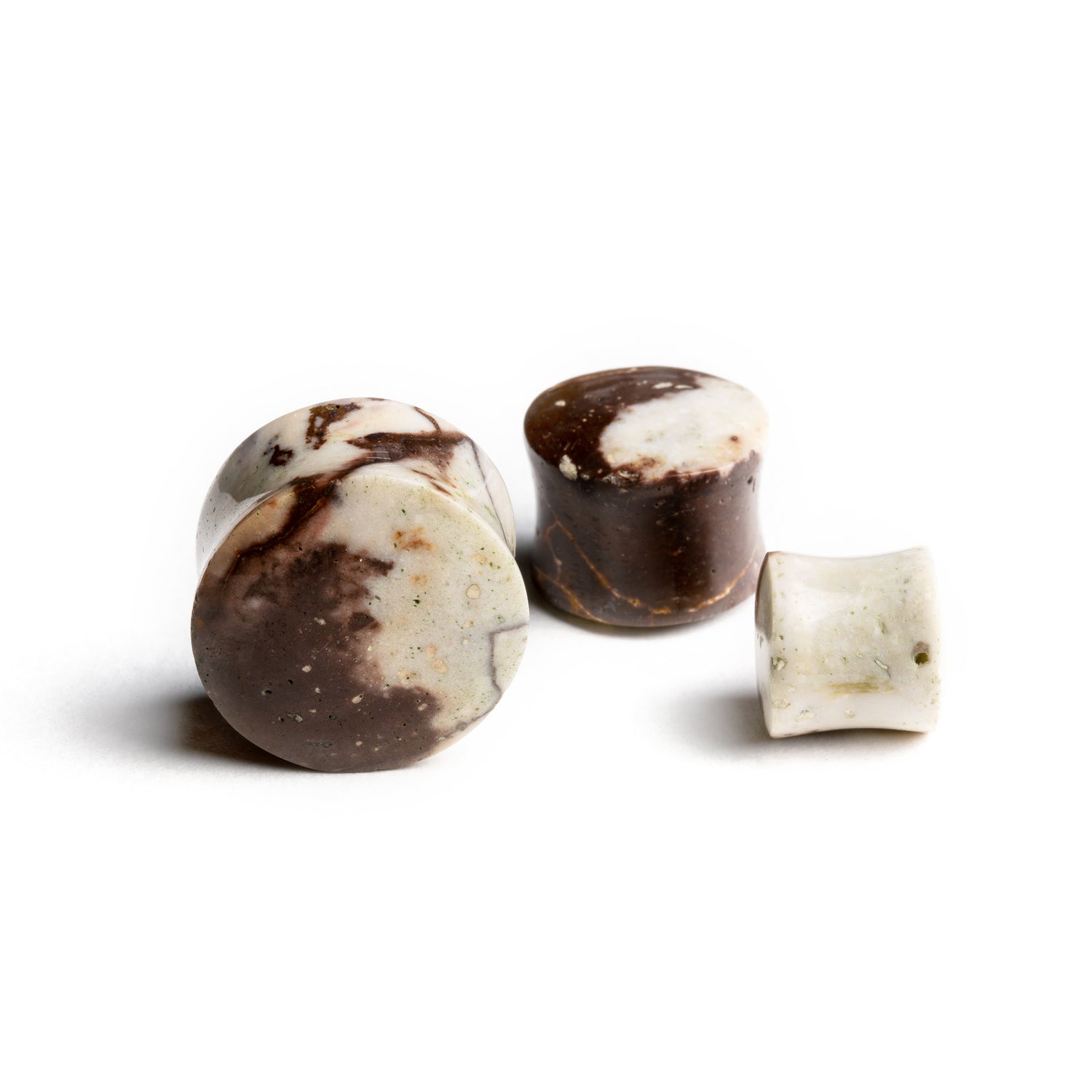 several sizes of Chocolate Jasper stone double flare ear plugs