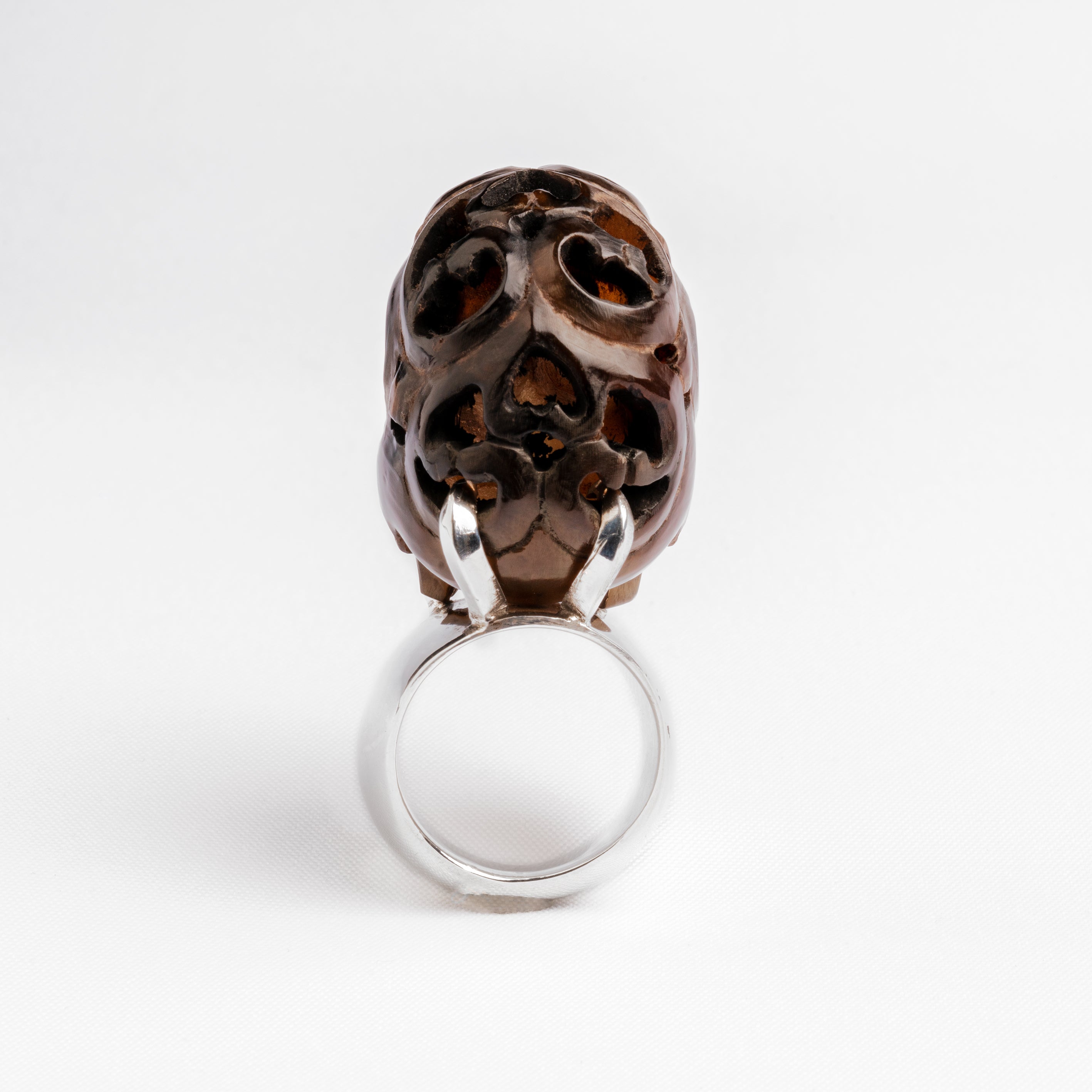 Carved skull and silver ring