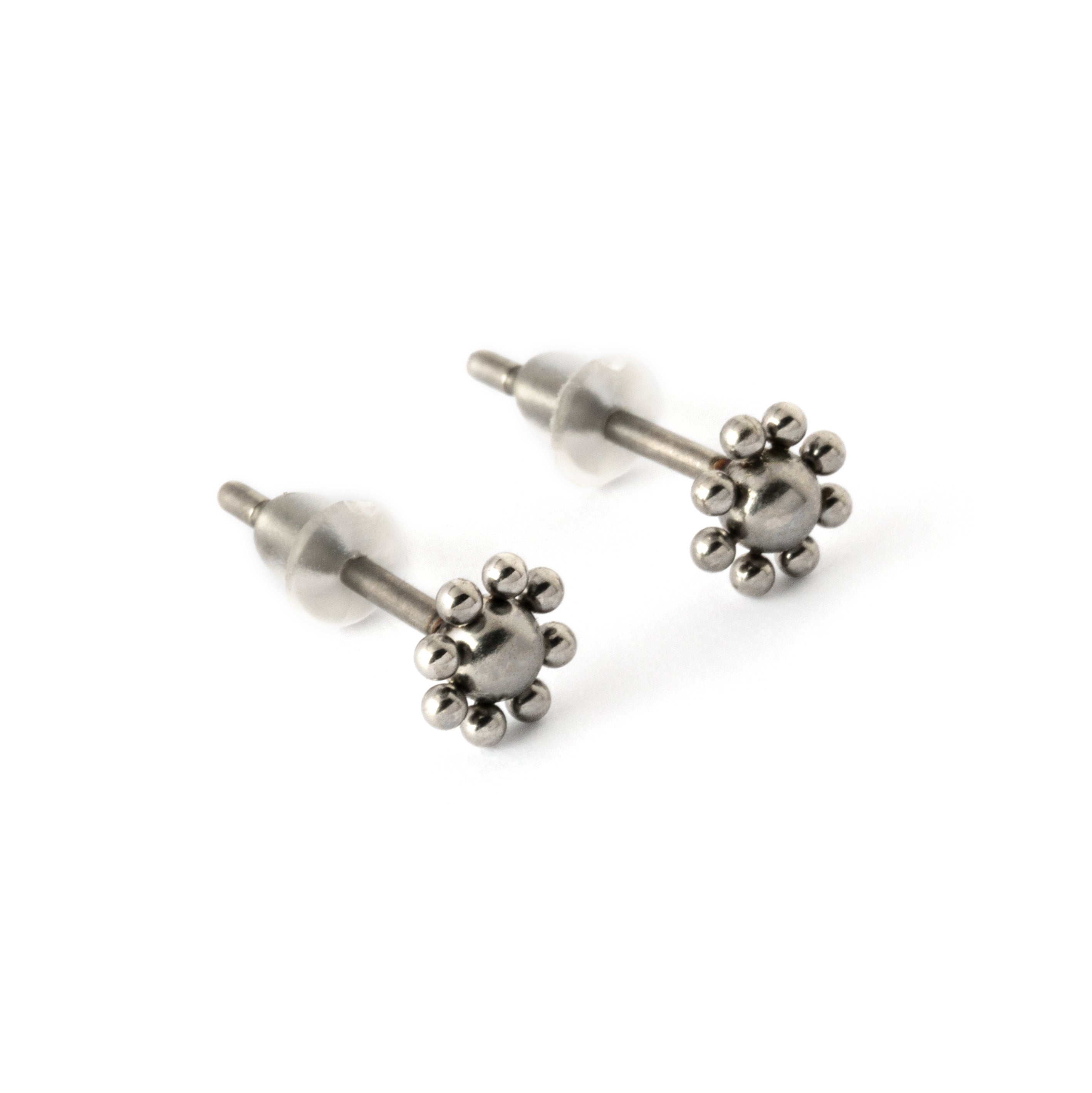 pair of surgical steel flower stud earrings front right view
