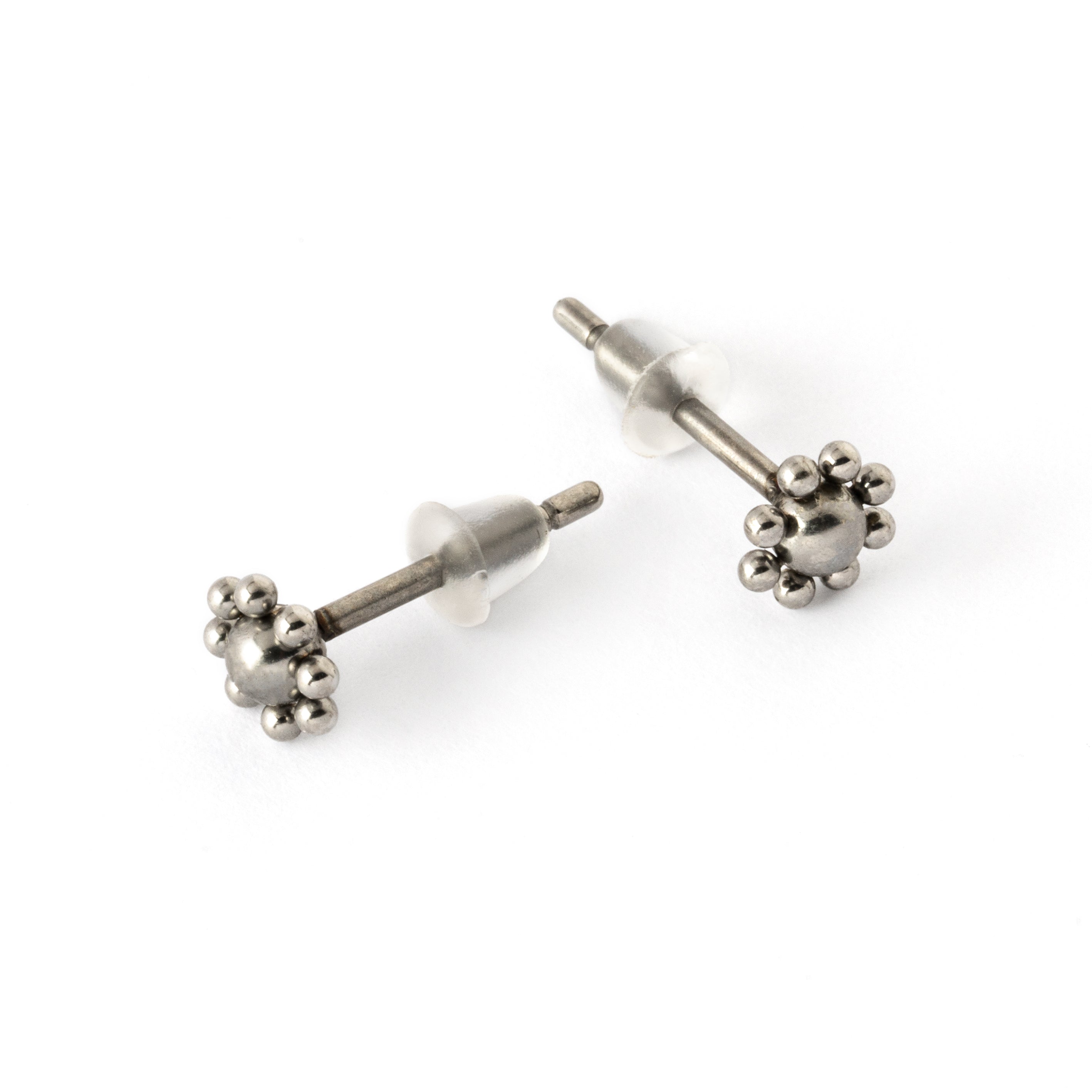 pair of surgical steel flower stud earrings left and right view 