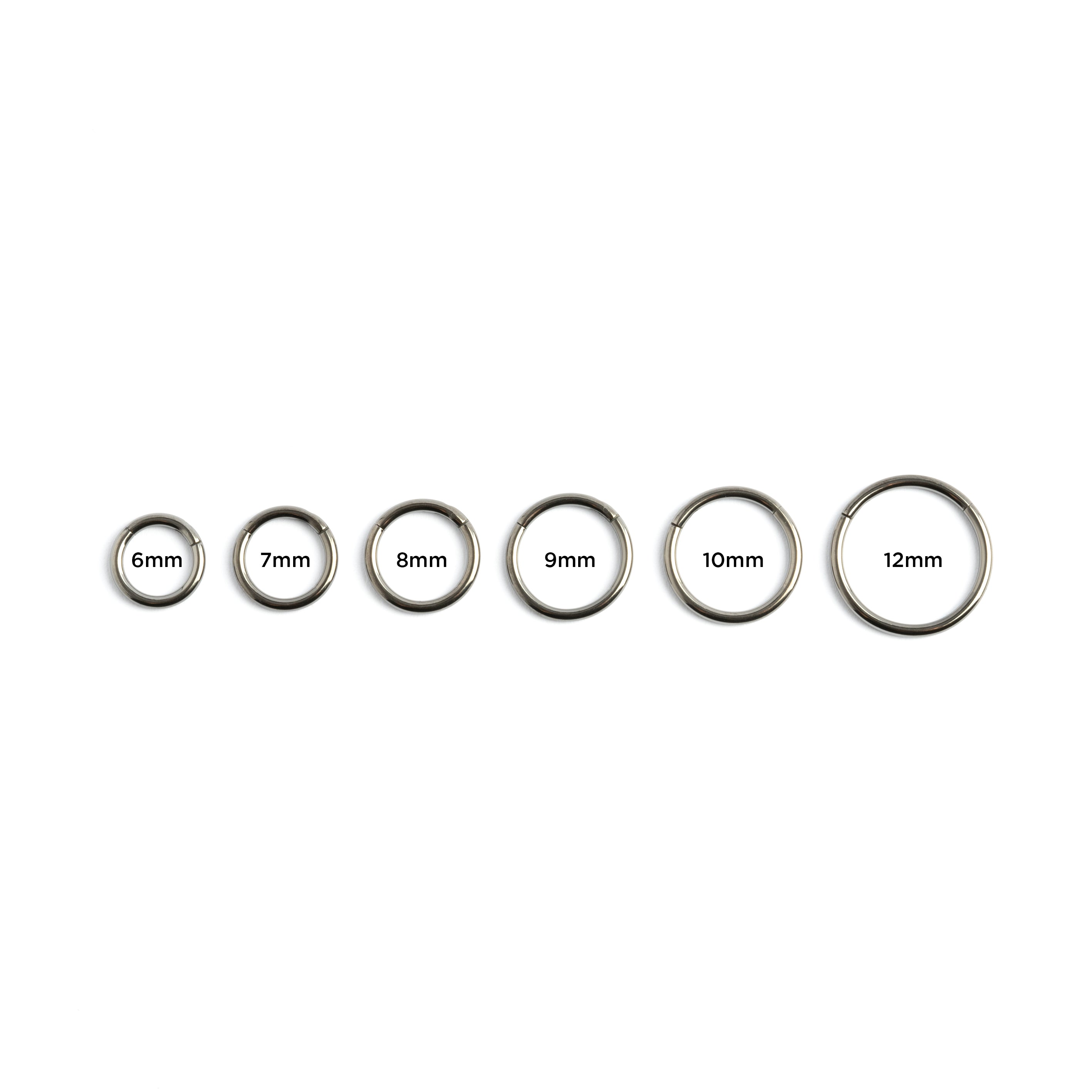 all sizes dark steel clicker piercing rings frontal view